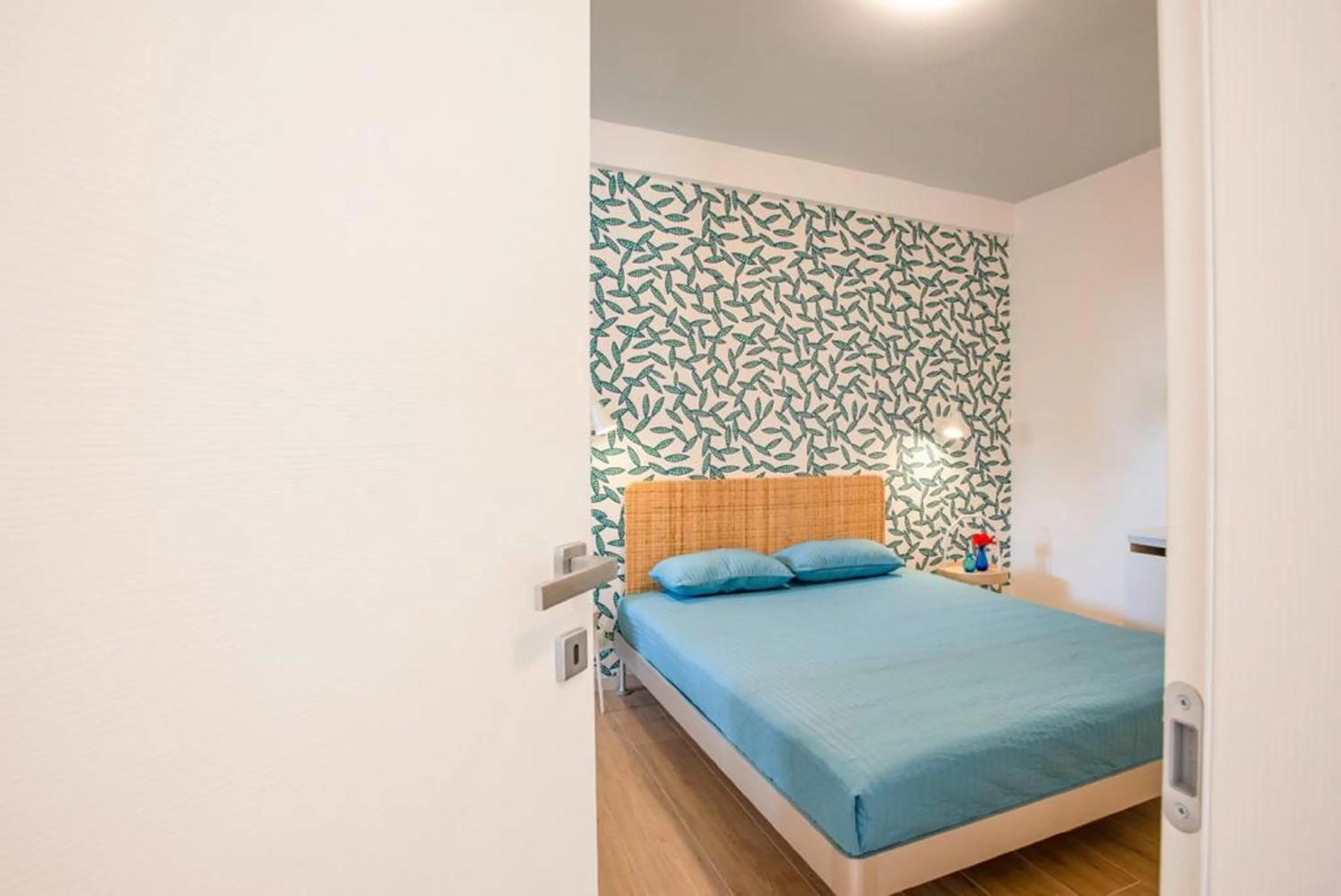 Bed in I Giardini di Athena- Athena Resort