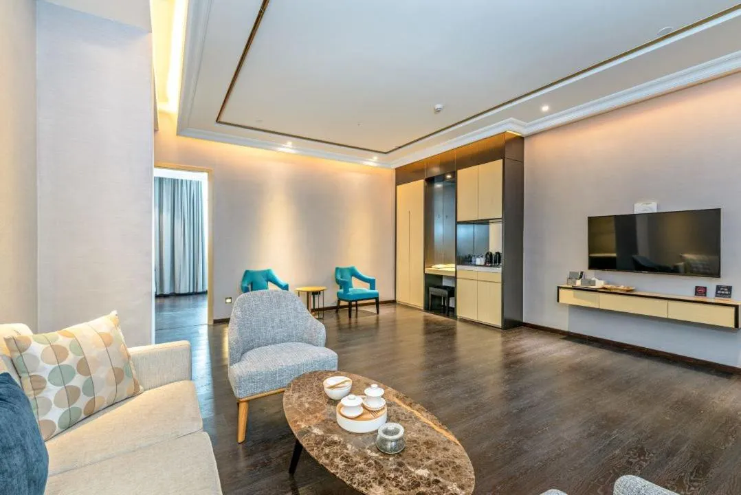 Living room in Guangzhou Mustin Hotel