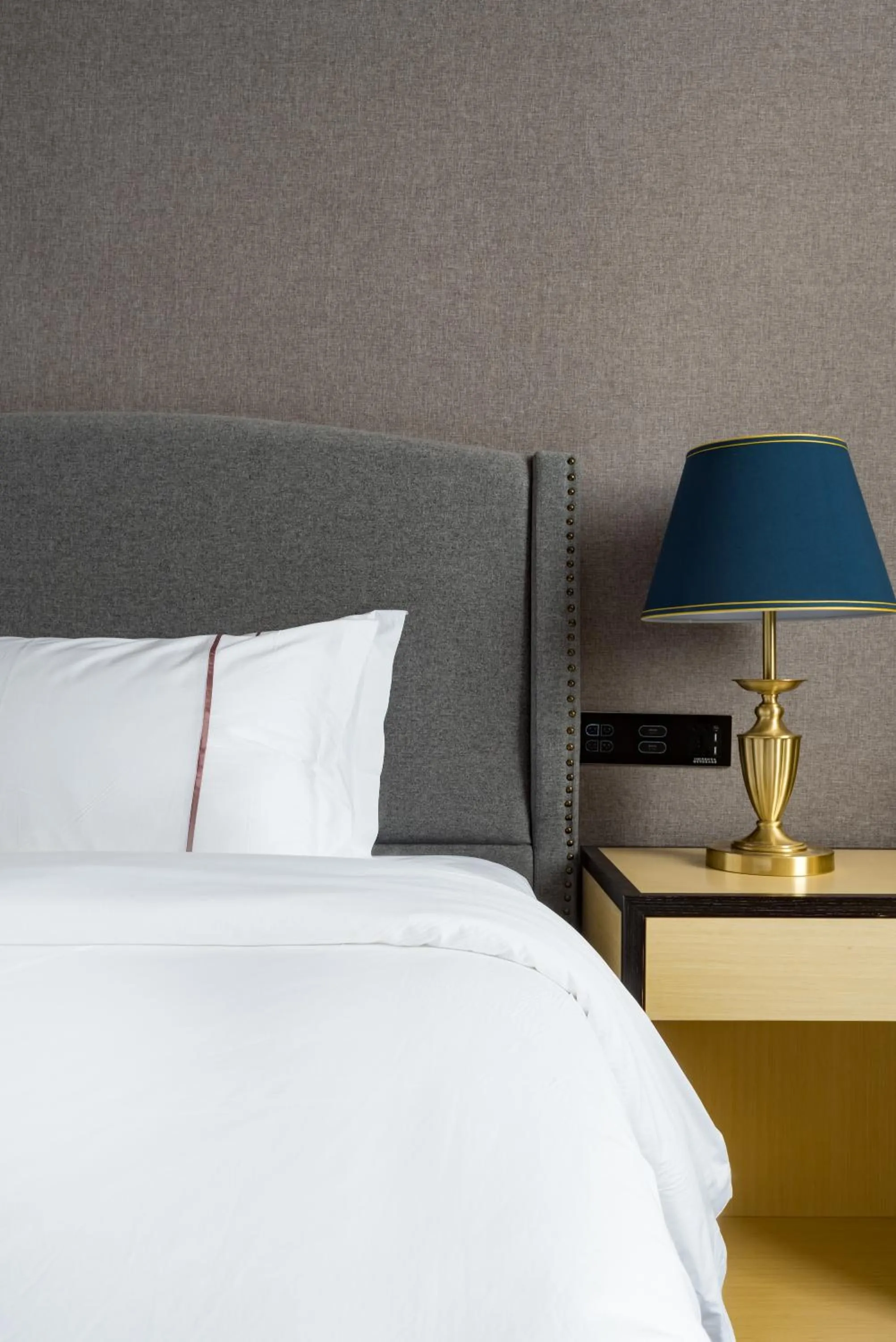 Bed in Guangzhou Mustin Hotel