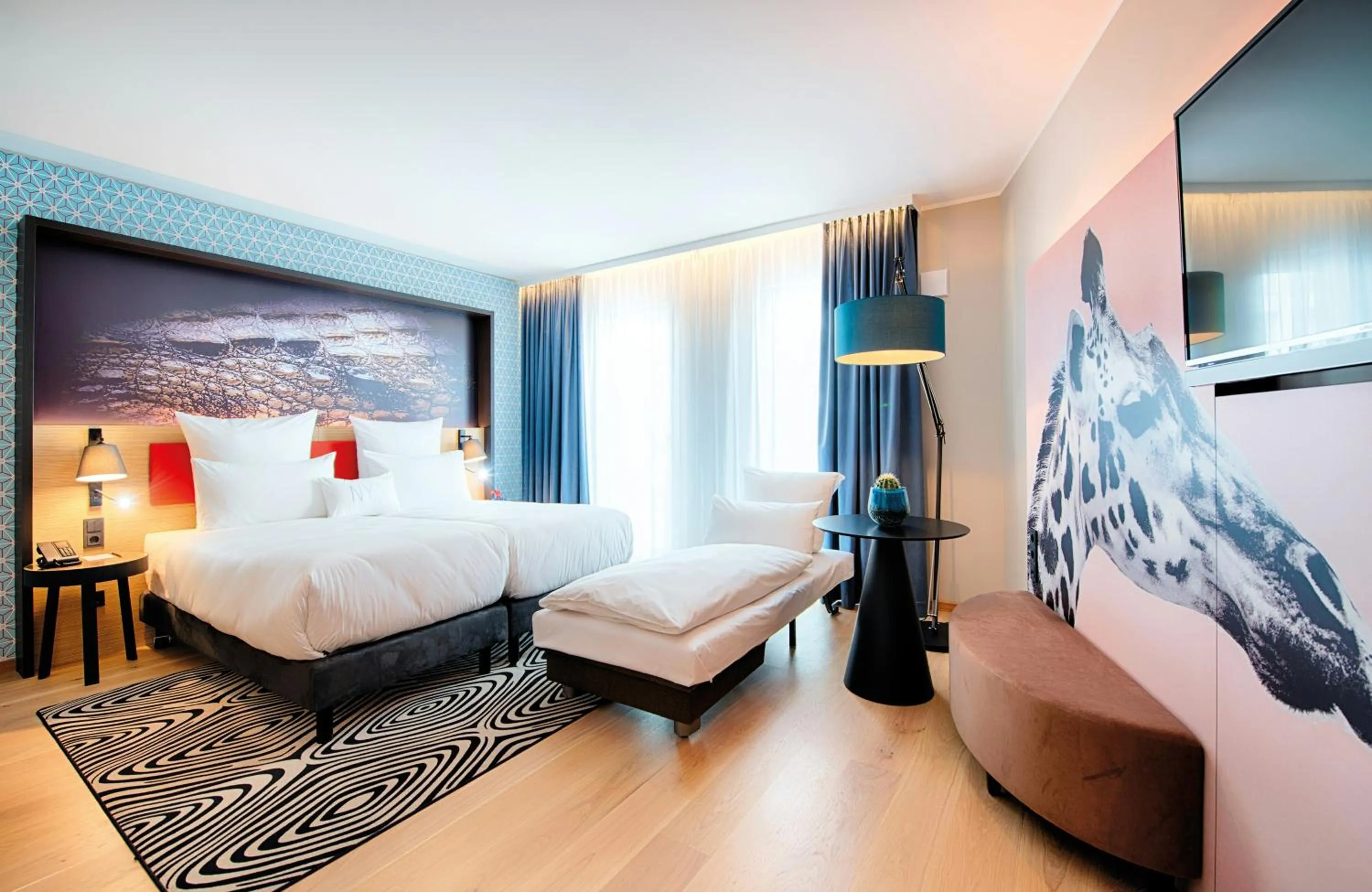 Photo of the whole room, Bed in NYX Hotel Munich by Leonardo Hotels