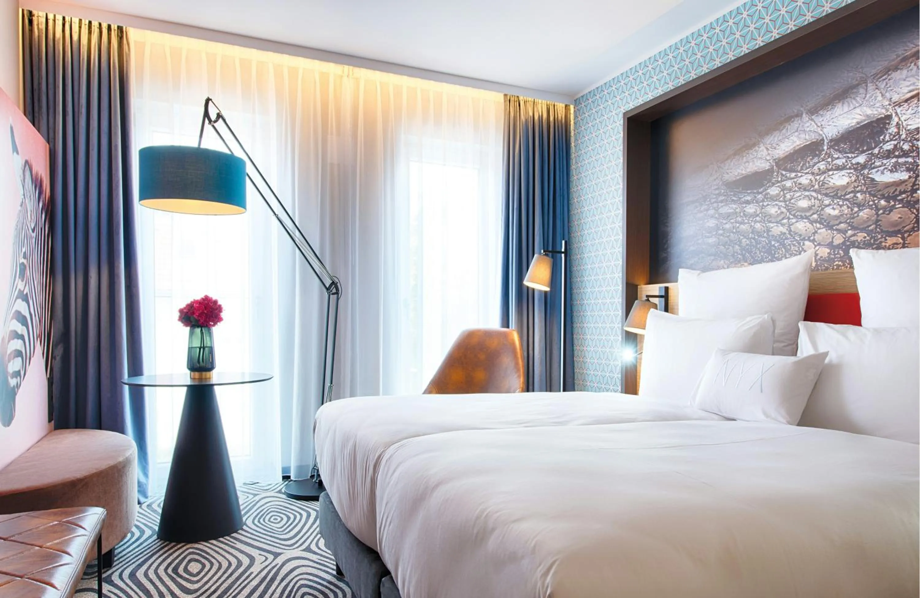 Photo of the whole room, Bed in NYX Hotel Munich by Leonardo Hotels