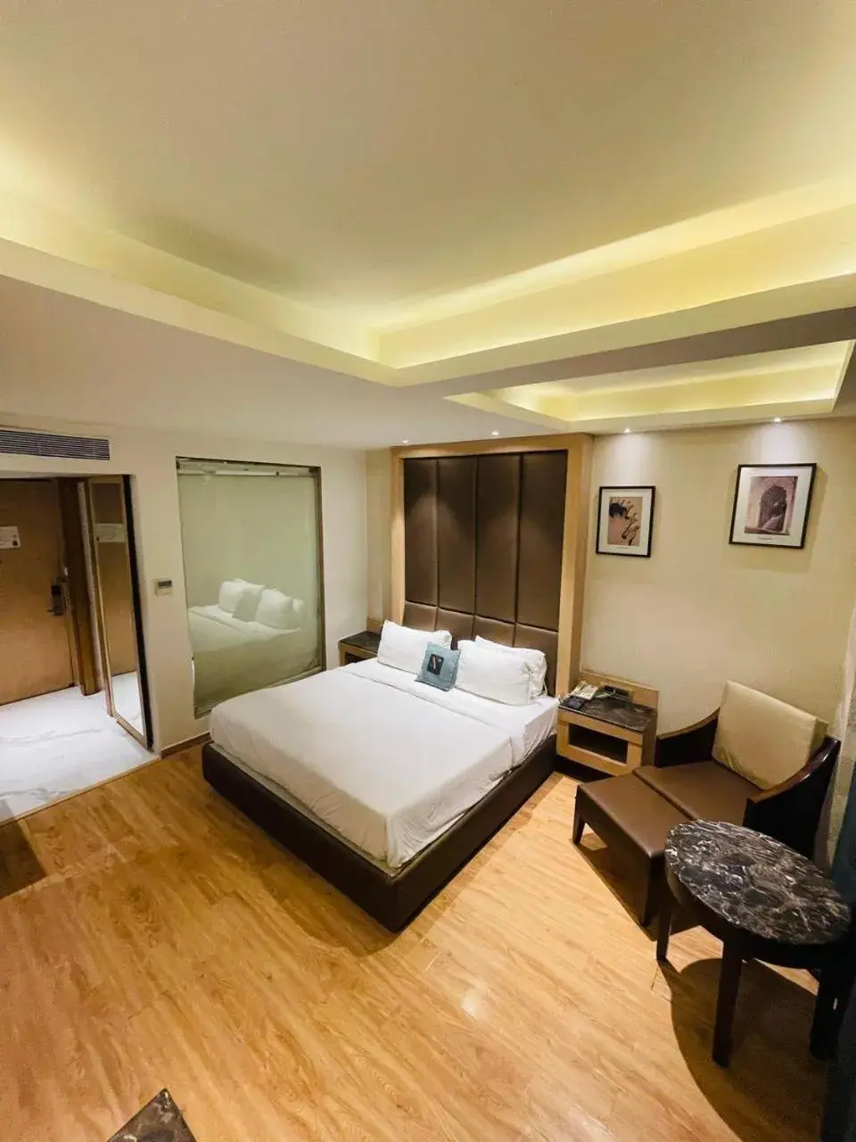 Photo of the whole room in Hotel V Hazratganj Photo of the whole room in Hotel V Hazratganj