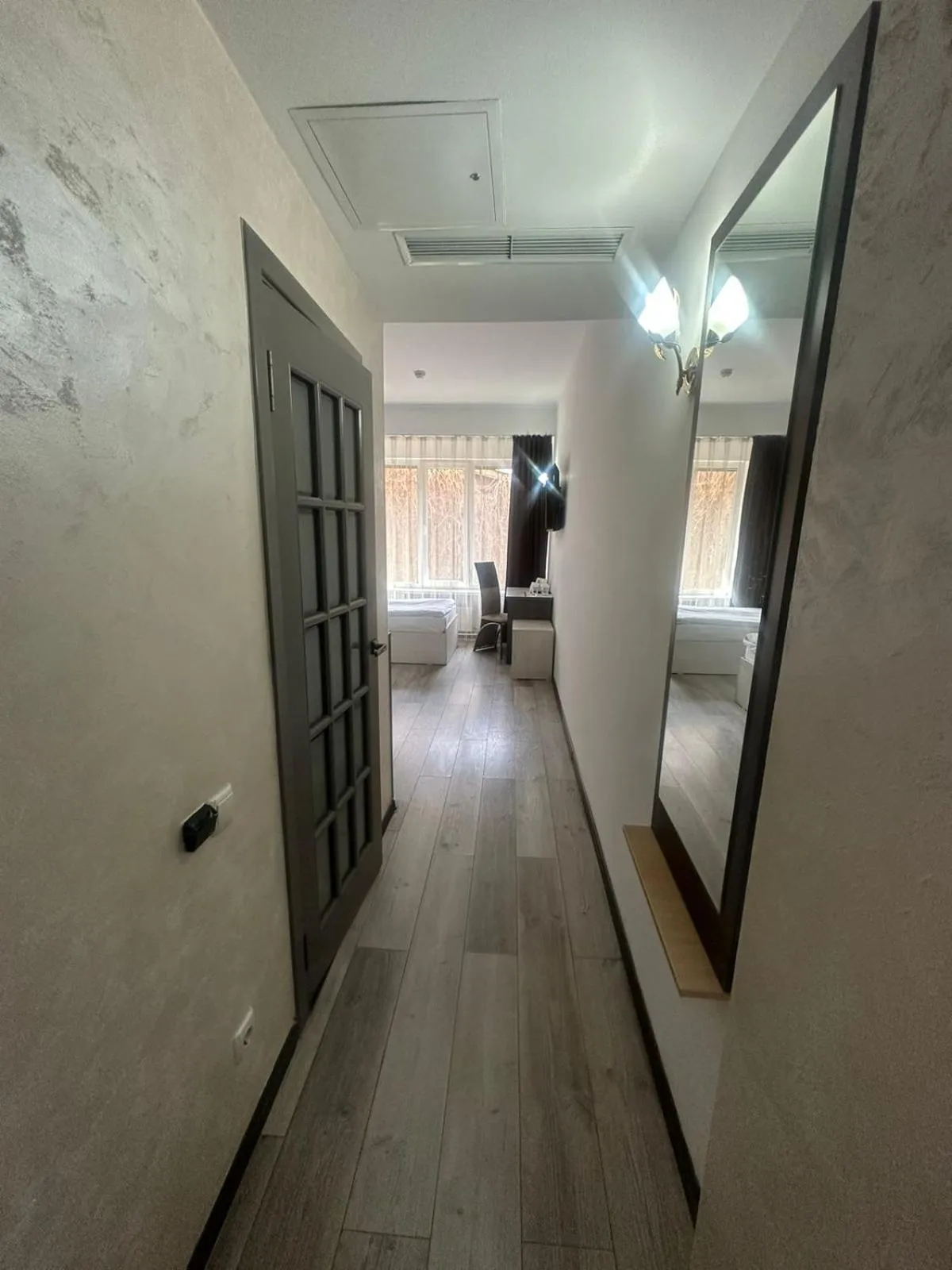 Photo of the whole room in Astra Hotel