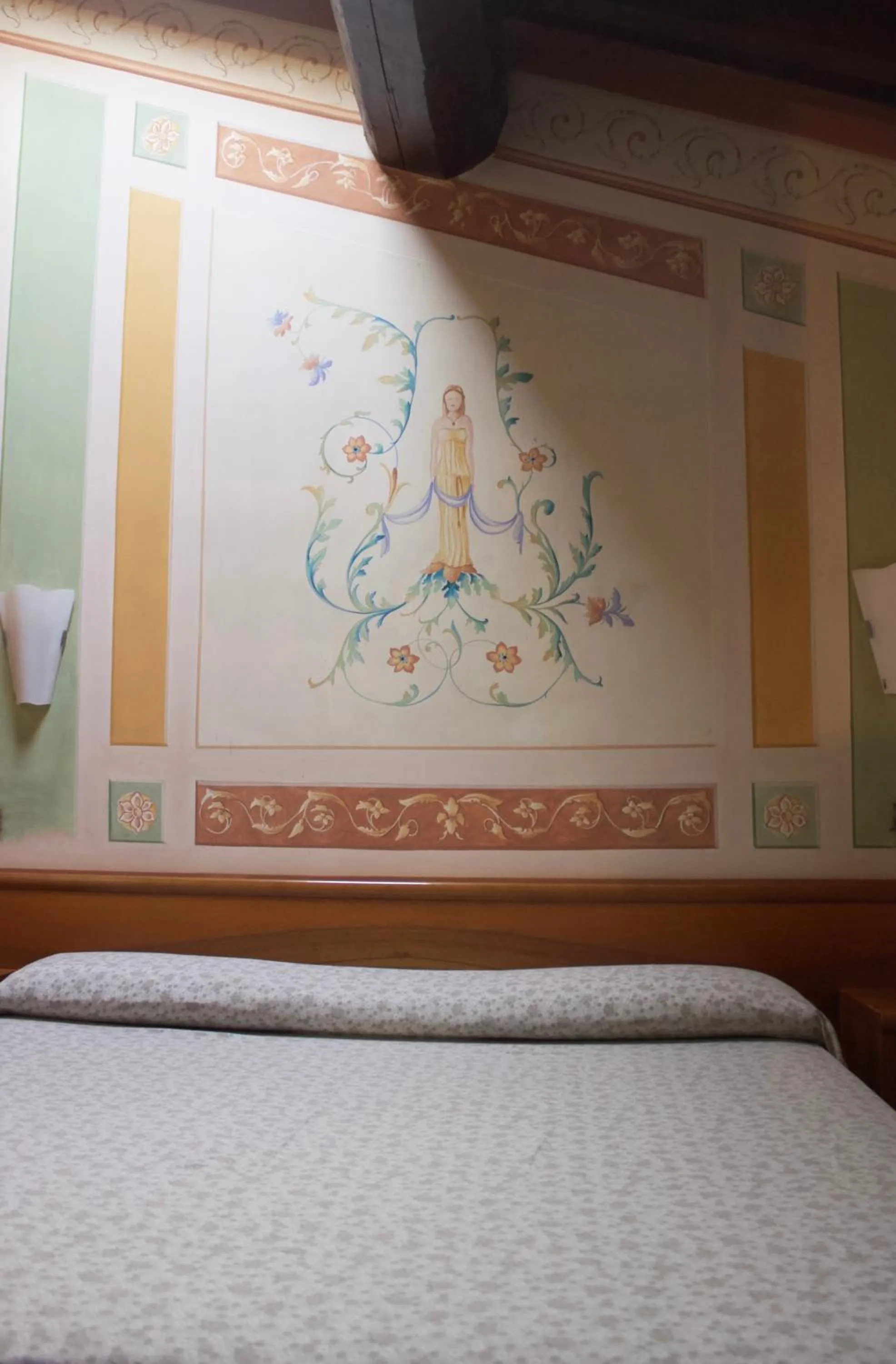Decorative detail, Bed in Albergo Giulia Gonzaga
