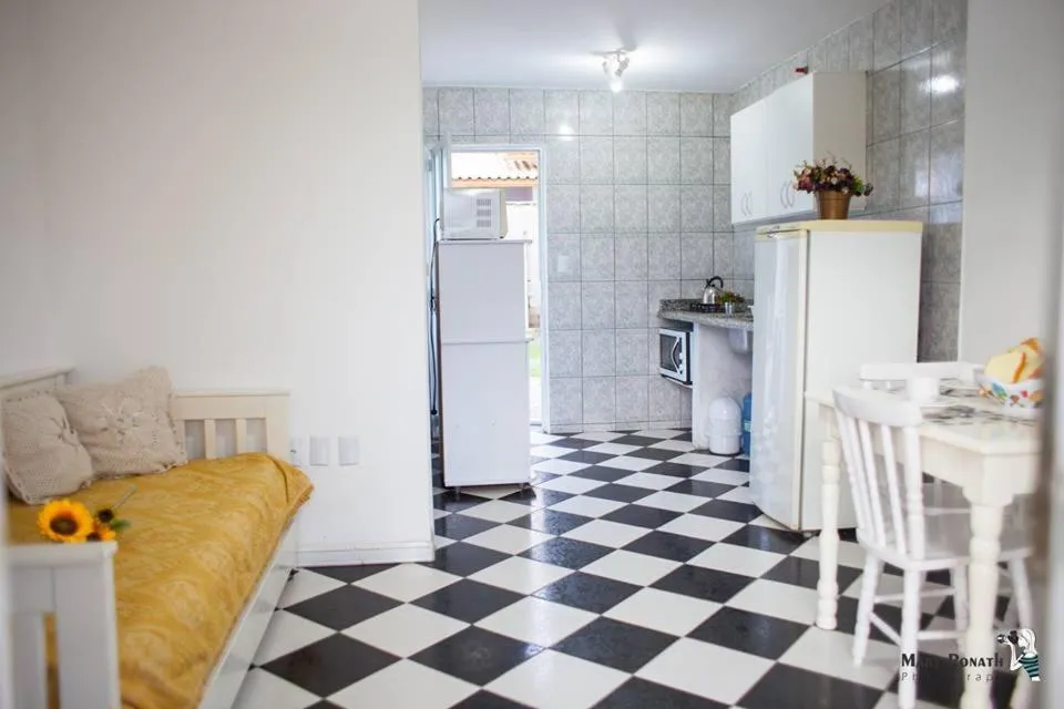 Kitchen or kitchenette in Di Raffaele Bombinhas