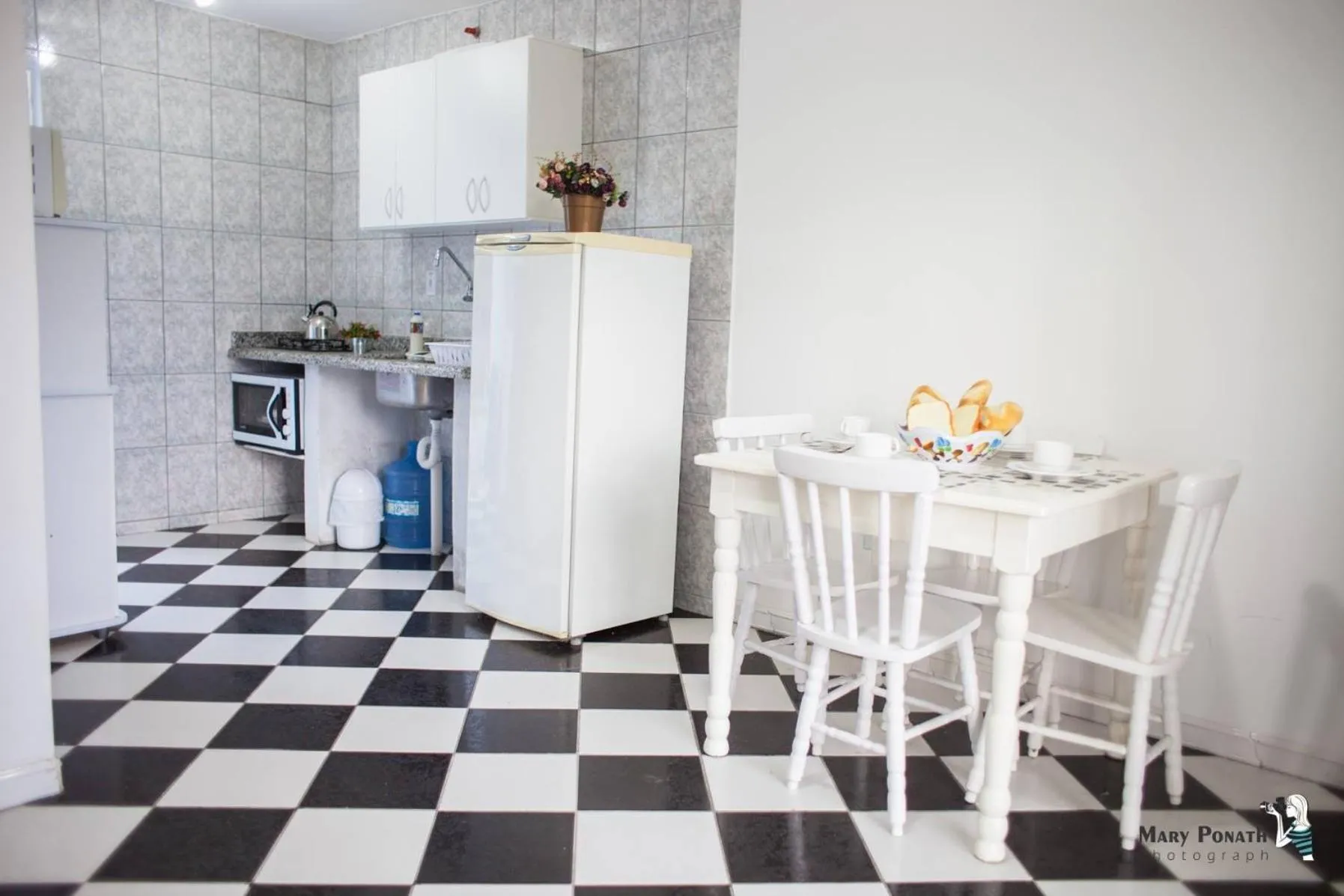Kitchen or kitchenette in Di Raffaele Bombinhas