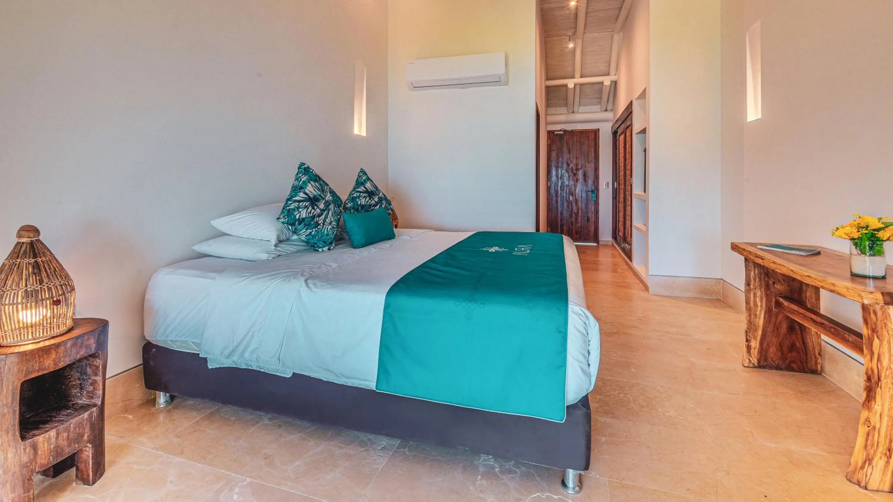 Bed in Aura Hotel Barú