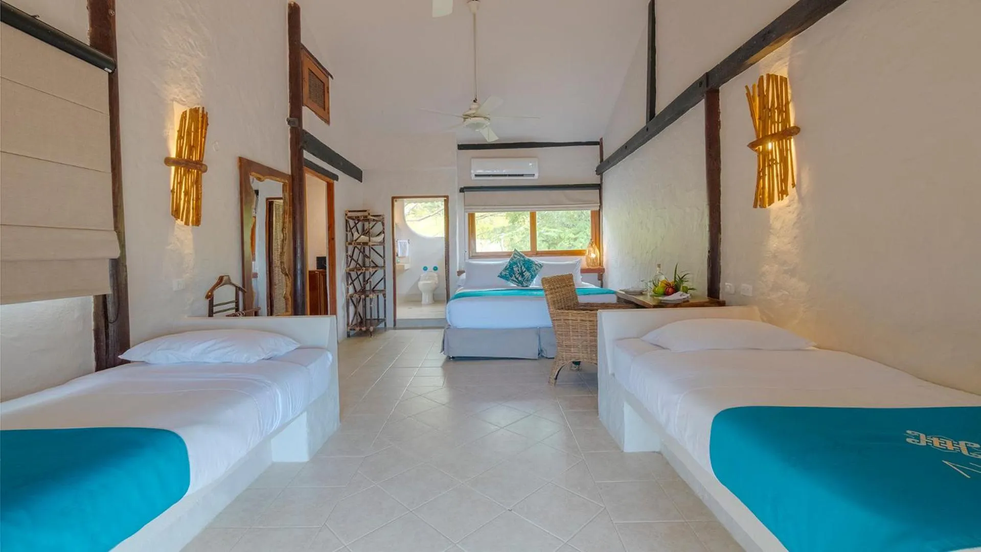 Bed in Aura Hotel Barú