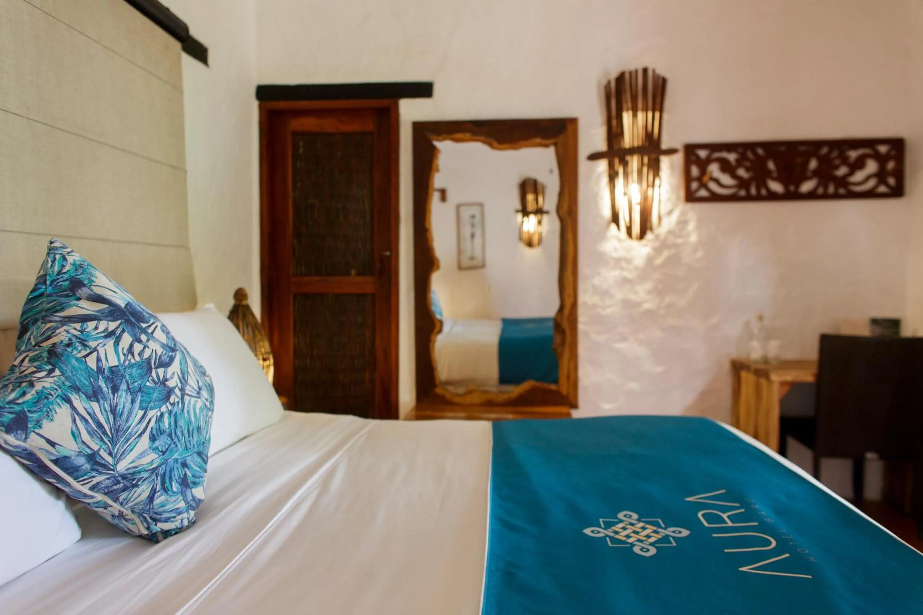 Bed in Aura Hotel Barú