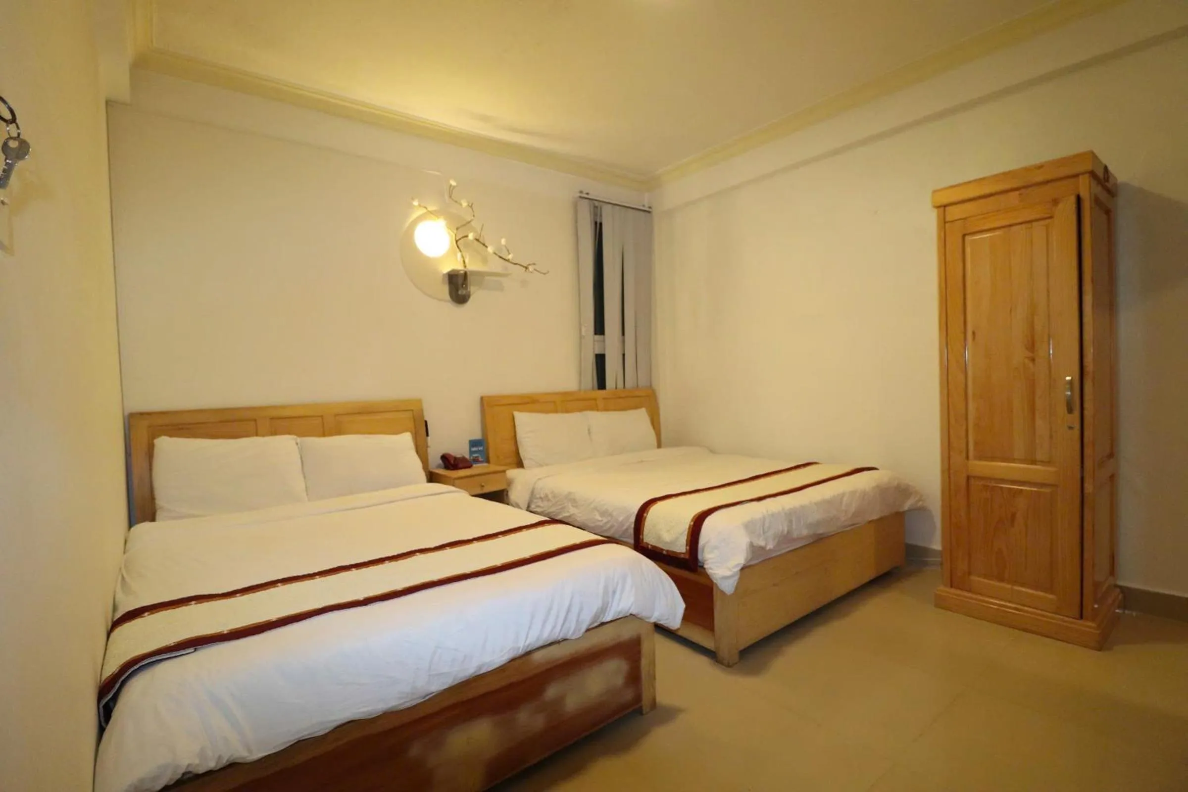 Bed in Mai Hoang Da Lat Hotel