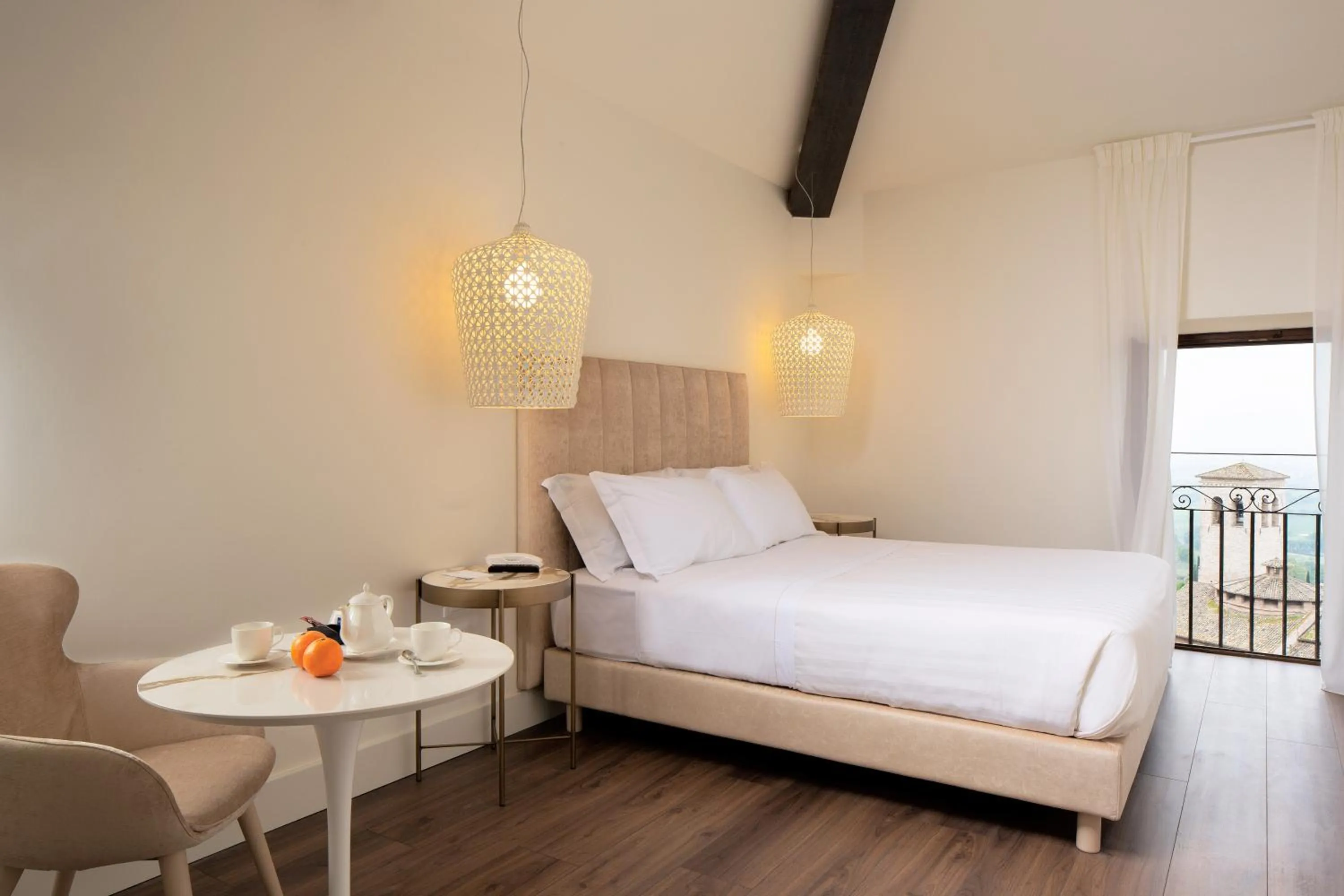 Bed in Giotto Hotel & Spa