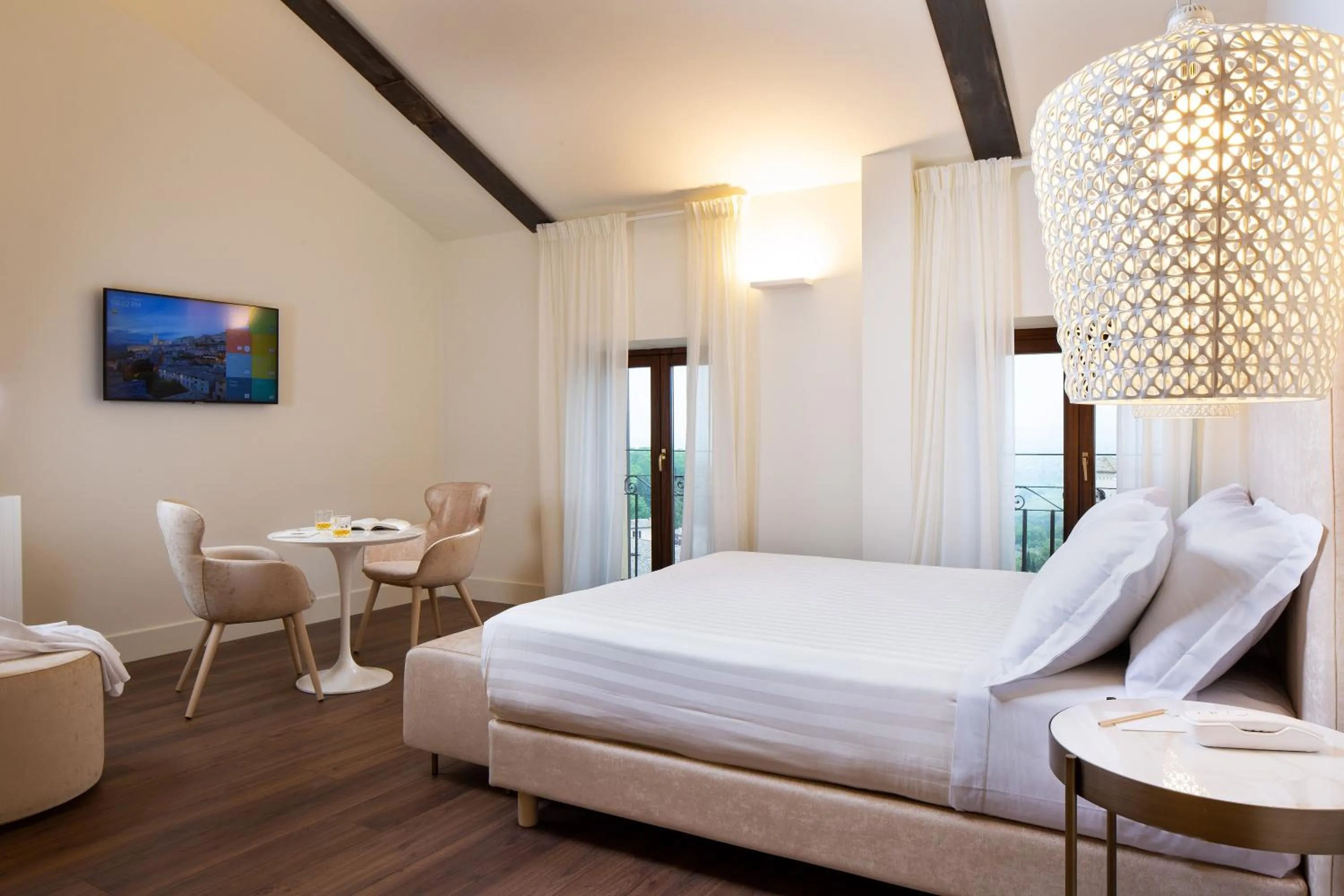 Bed in Giotto Hotel & Spa