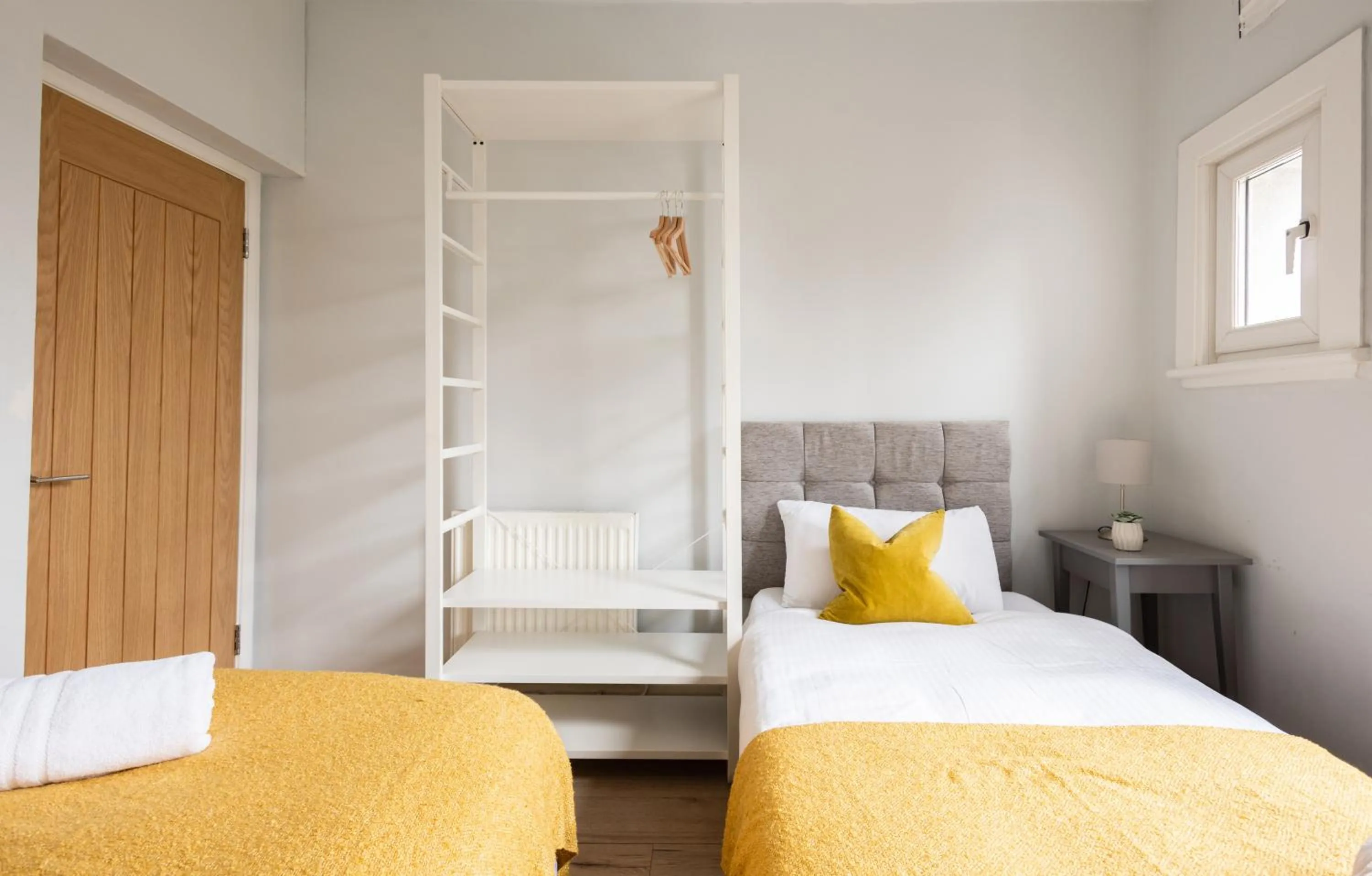 Bed in The Love Walk Apartments