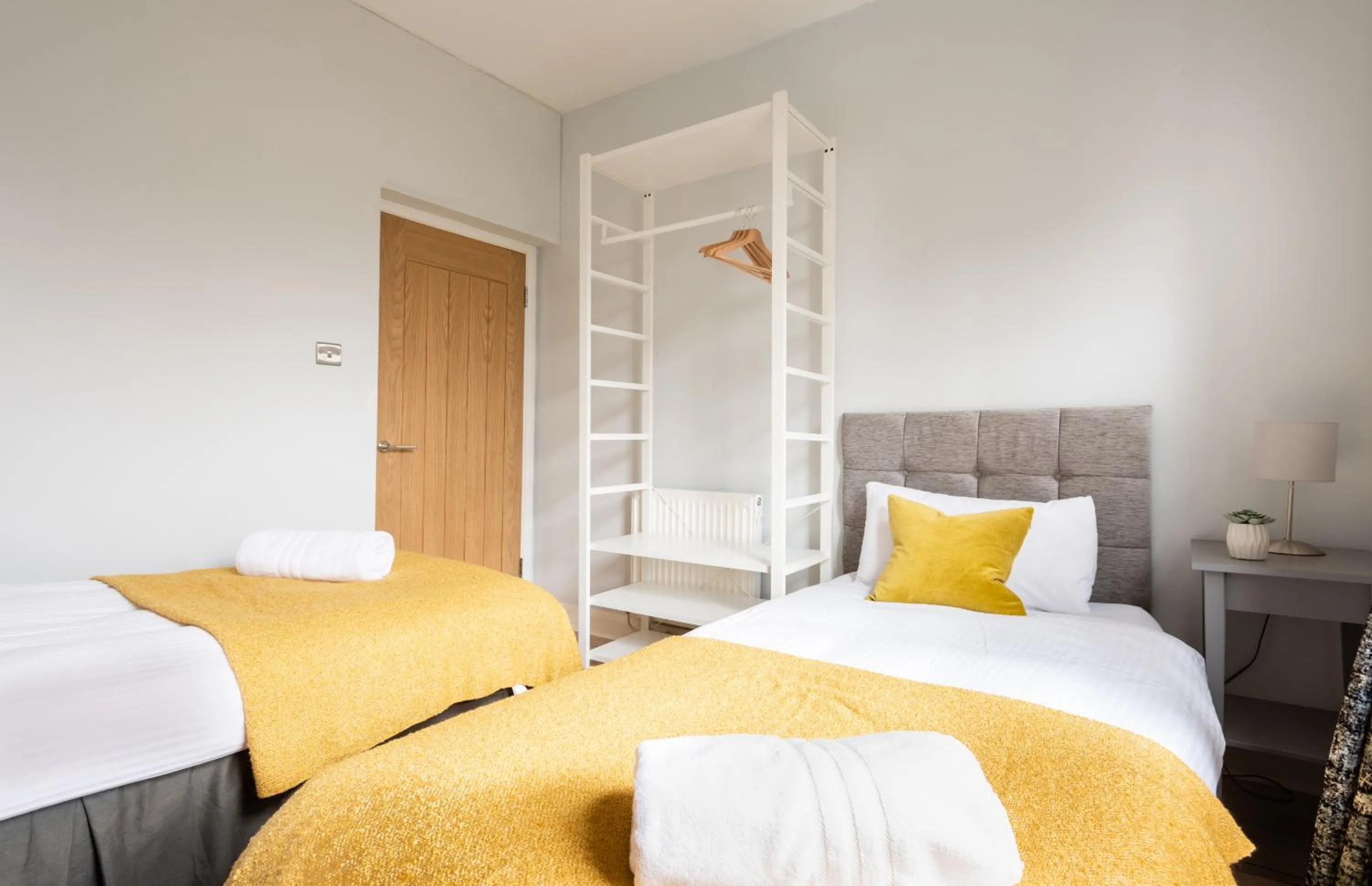 Bed in The Love Walk Apartments