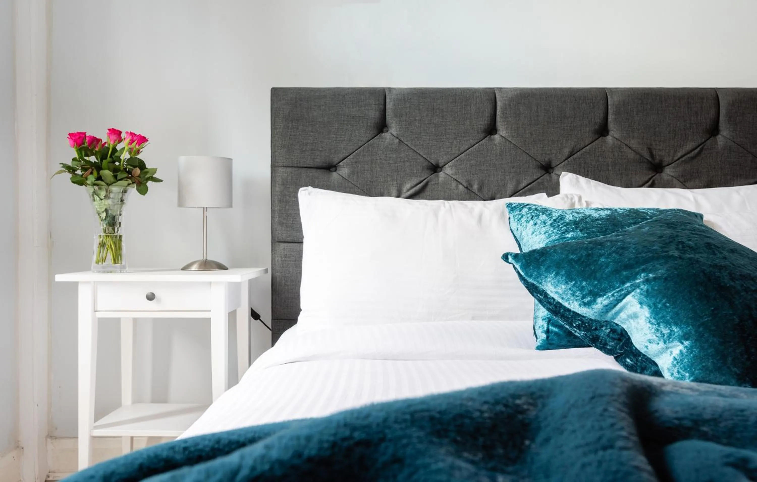 Bed in The Love Walk Apartments