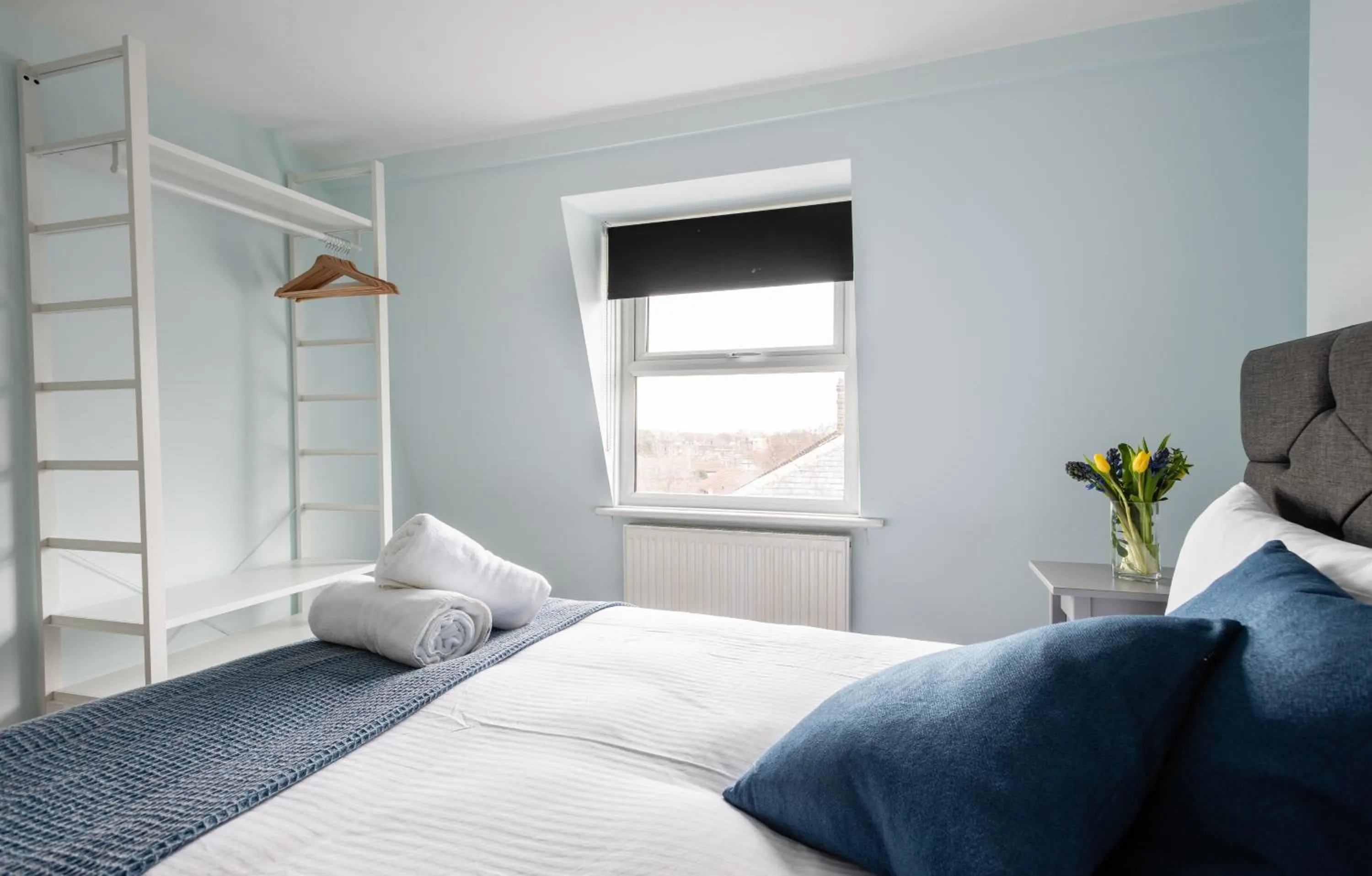 Bed in The Love Walk Apartments