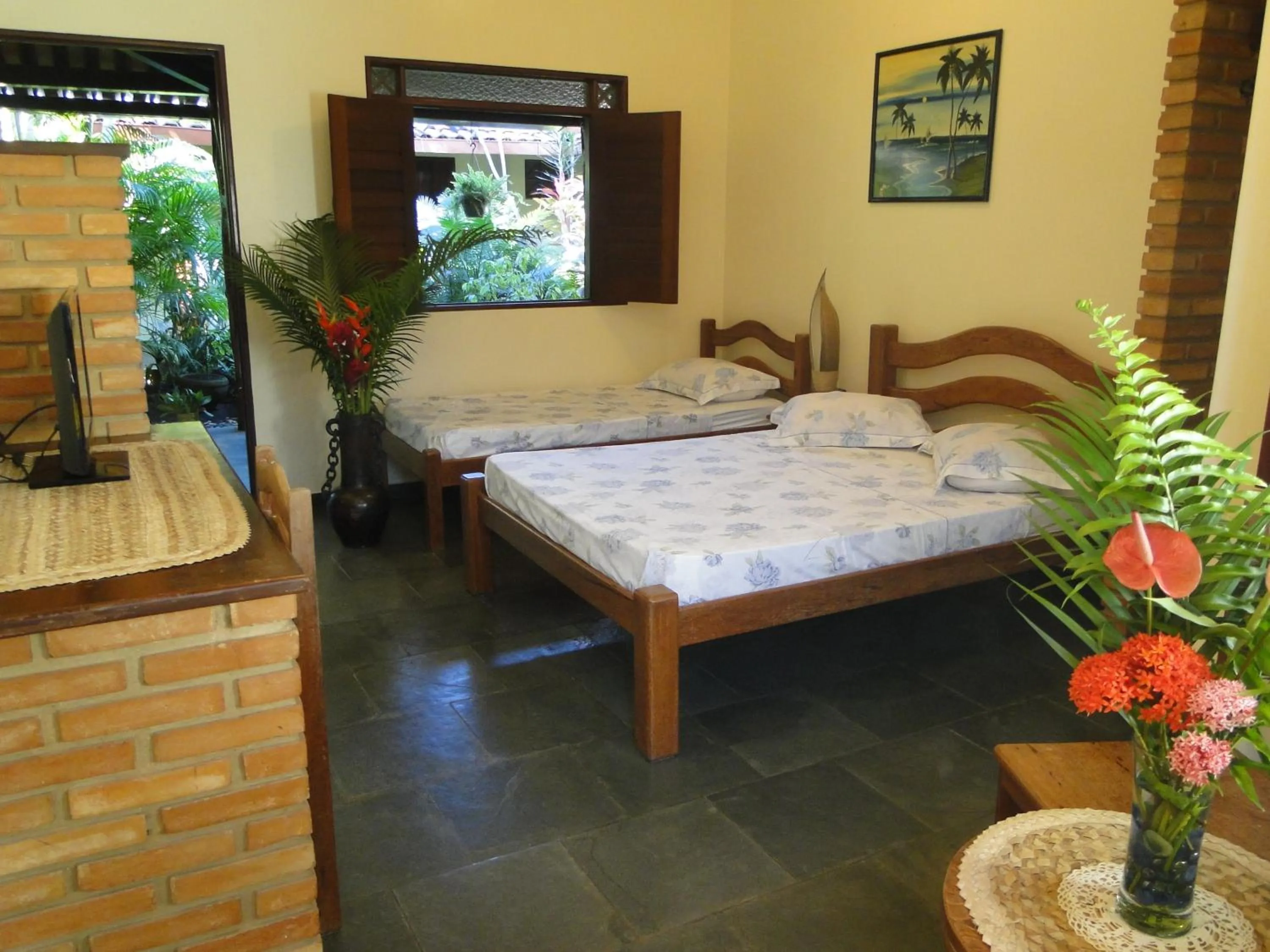 Bed in Hotel Pousada Arco Iris