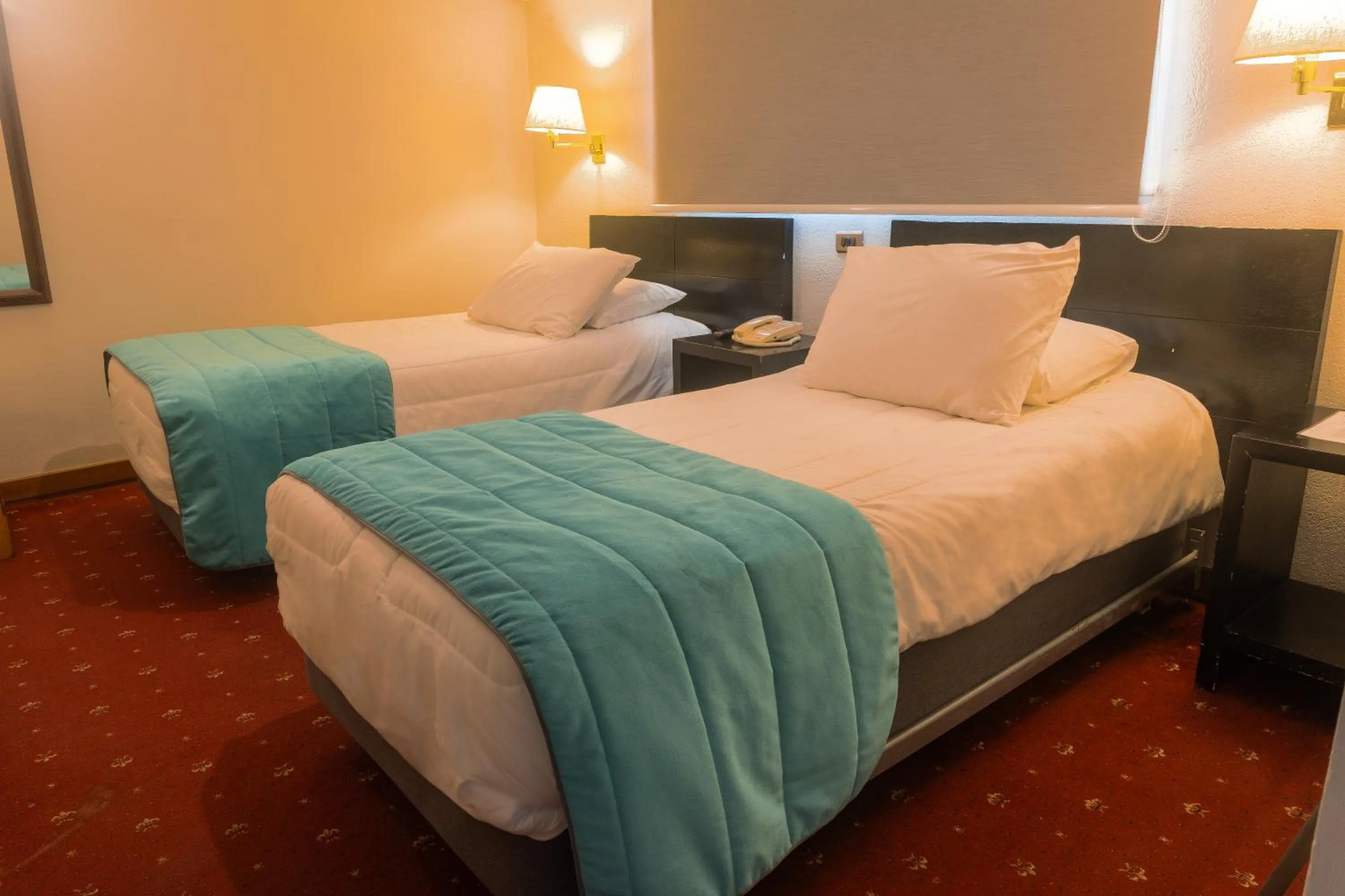 Bed in Hotel Gavina Express Arica