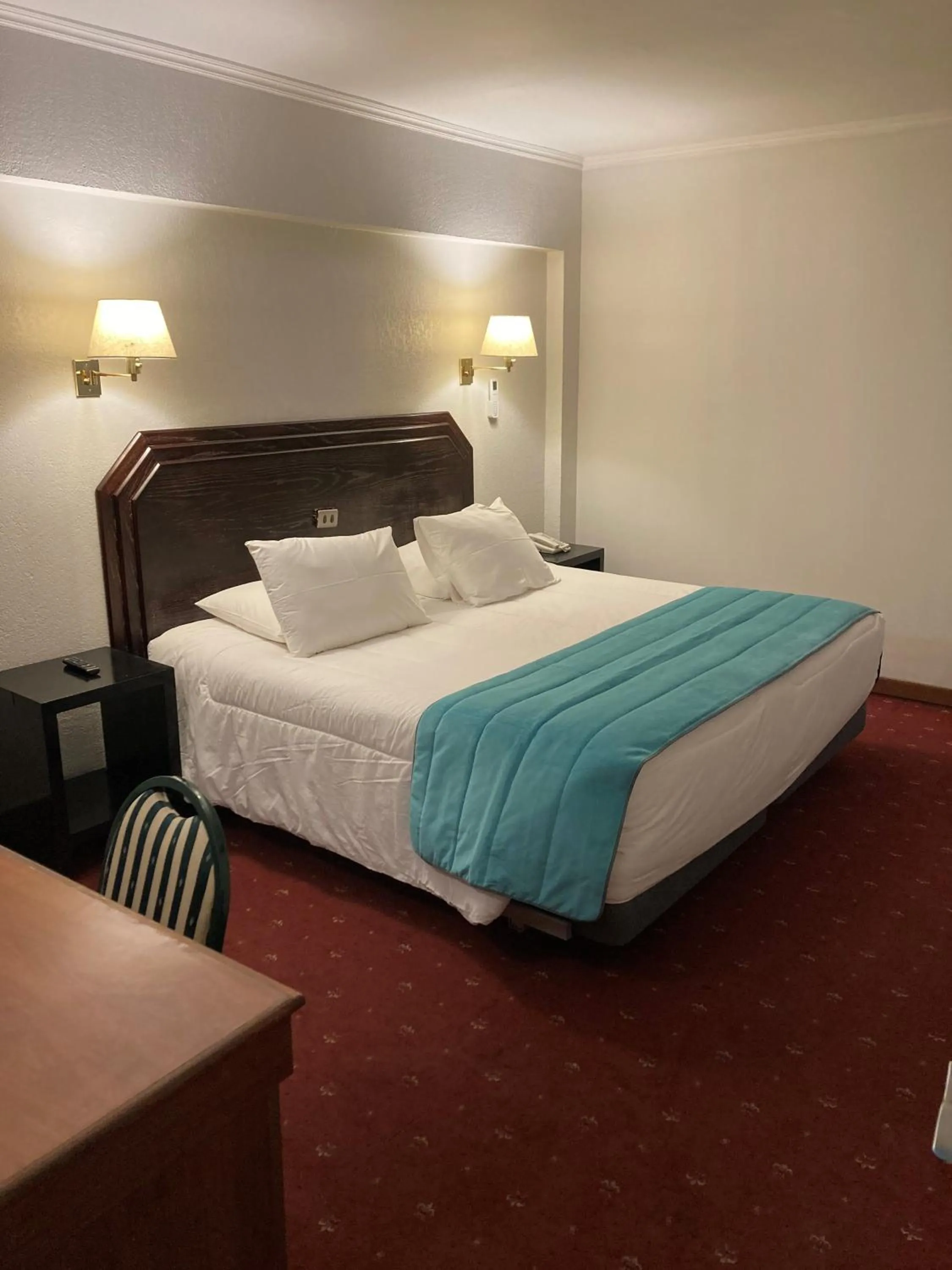 Bed in Hotel Gavina Express Arica