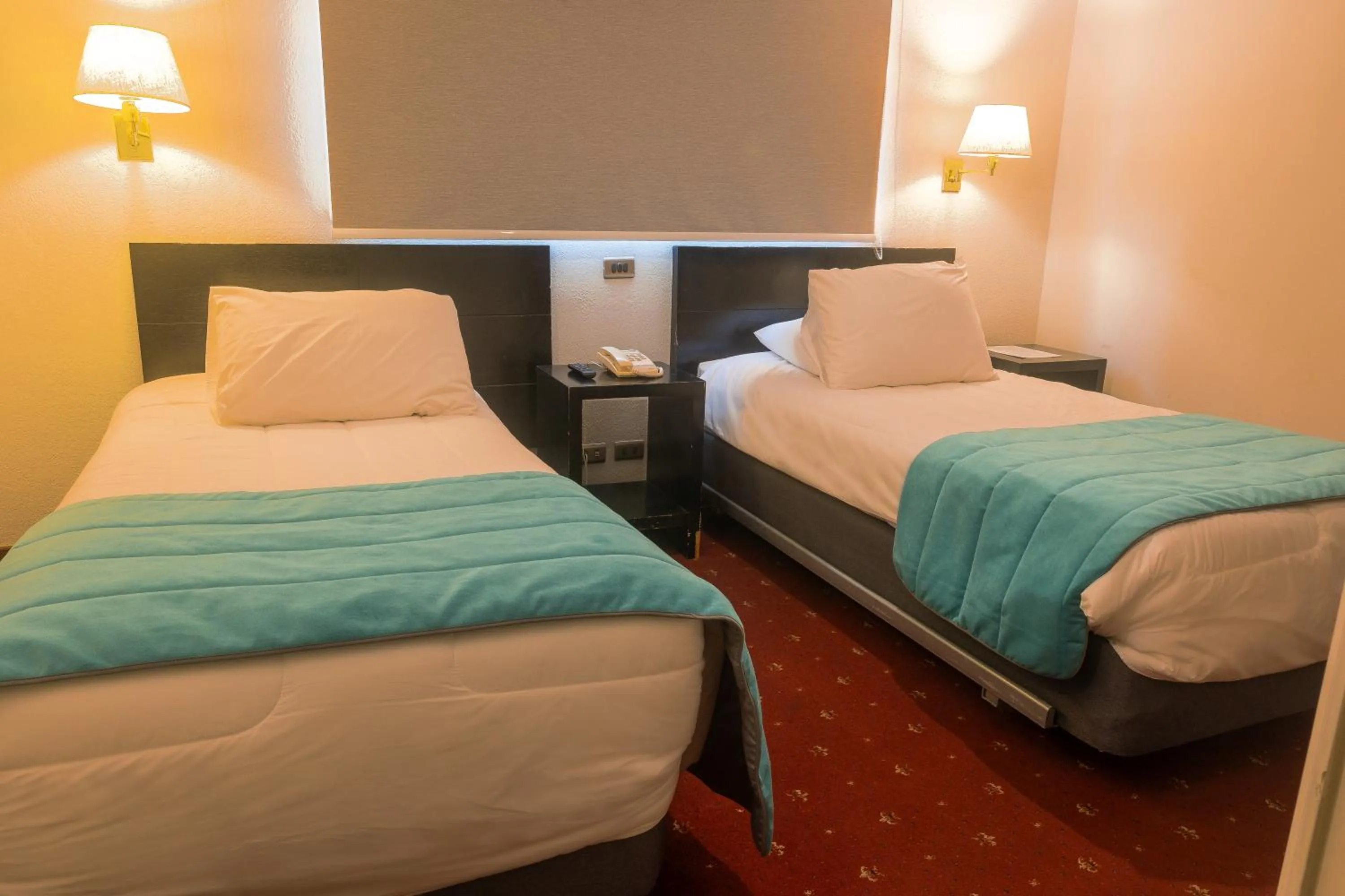 Bed in Hotel Gavina Express Arica