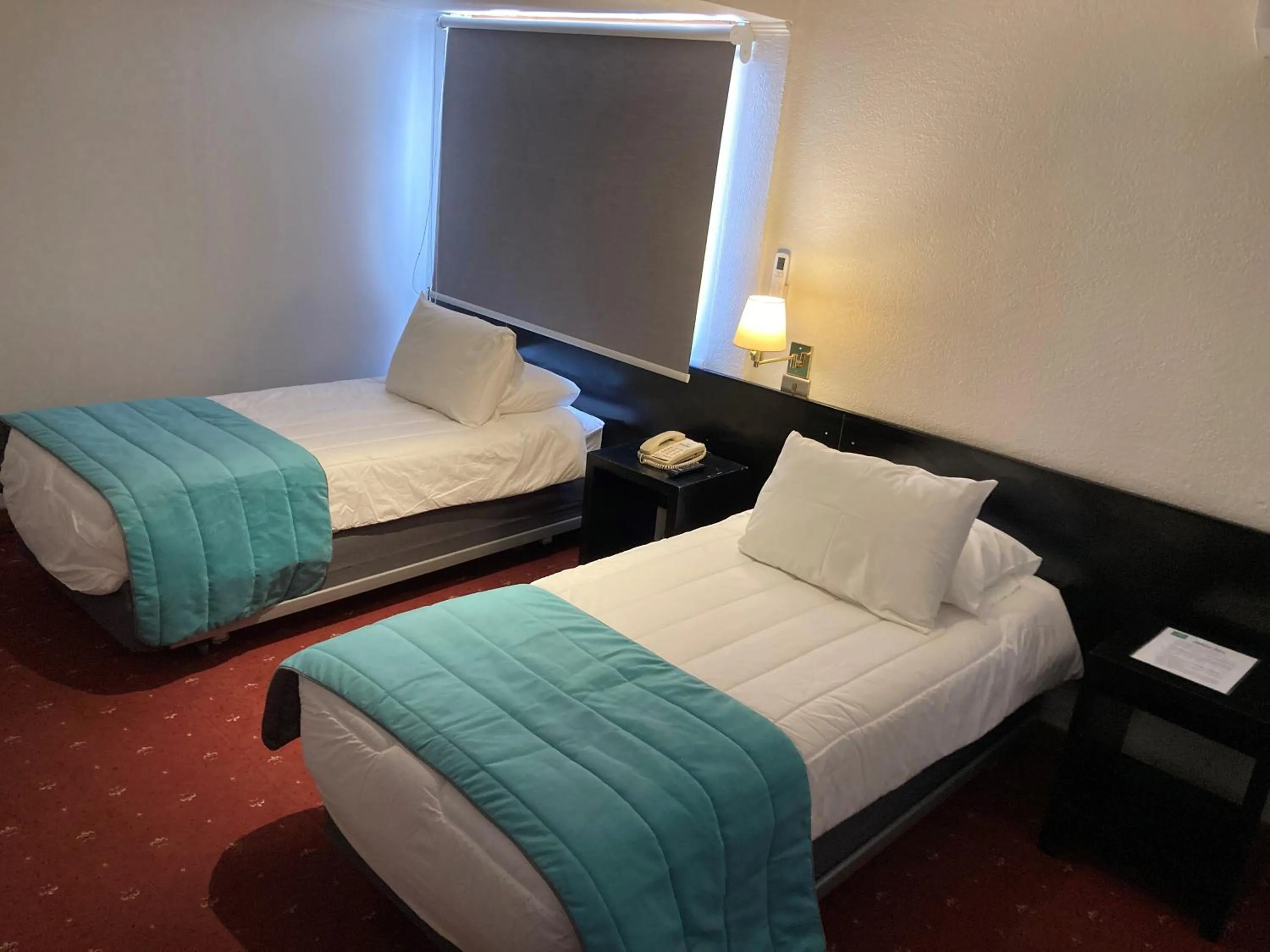 Bed in Hotel Gavina Express Arica