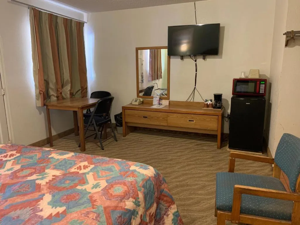 Bed in Western Motel