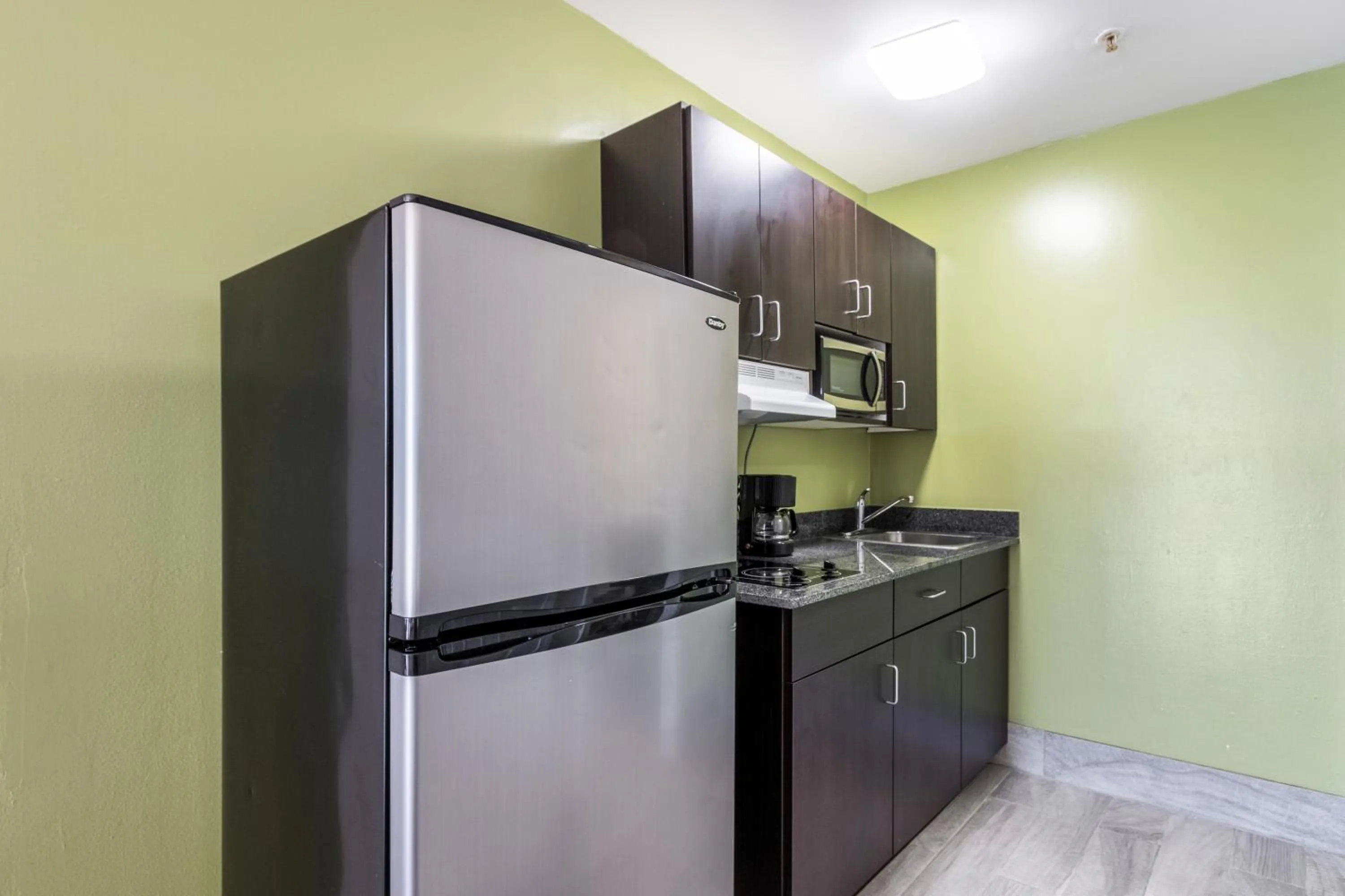 Kitchen or kitchenette in Studio 6-Savannah, GA