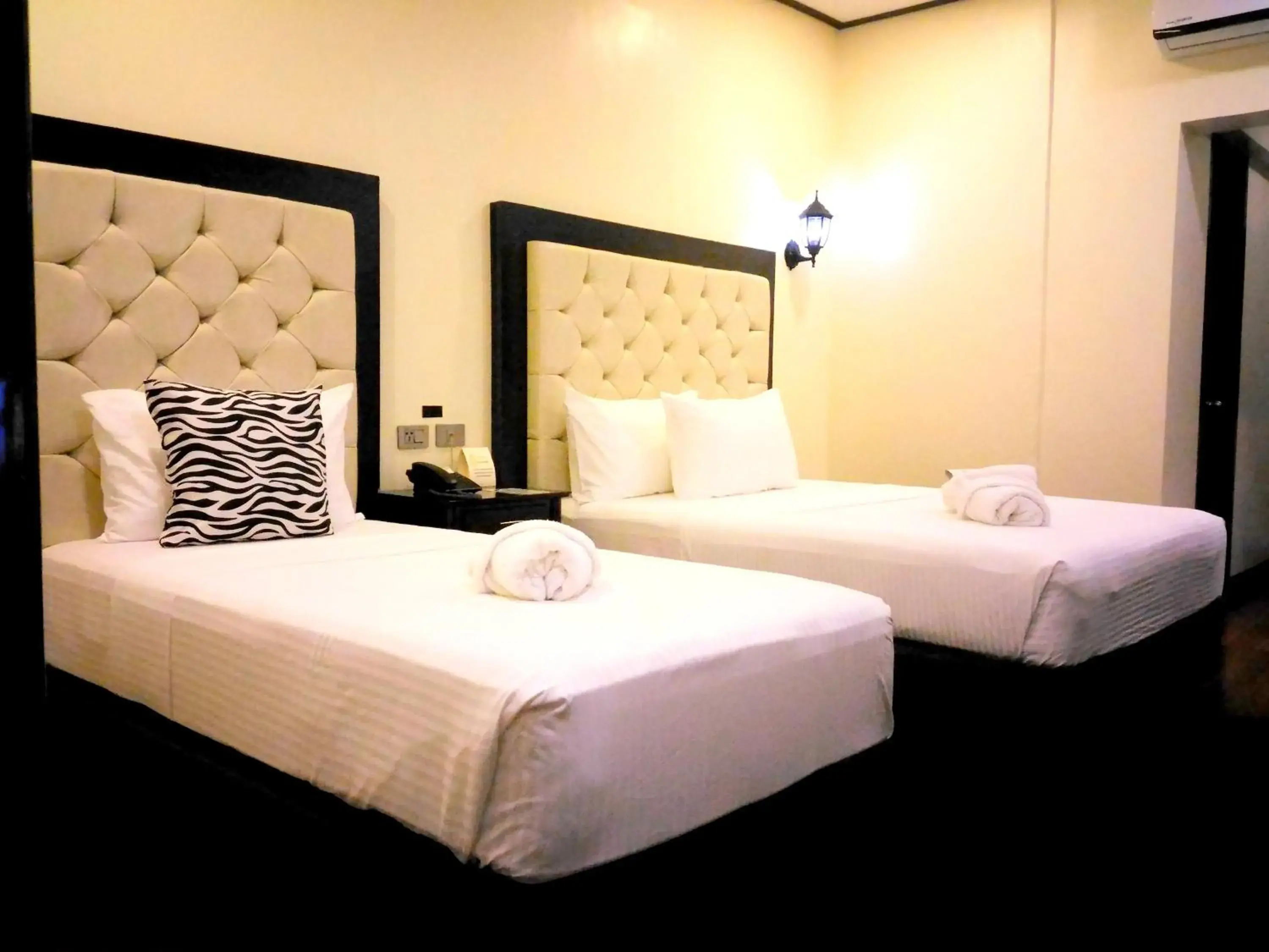 Triple Room in The Ambassador Hotel Triple Room in The Ambassador Hotel