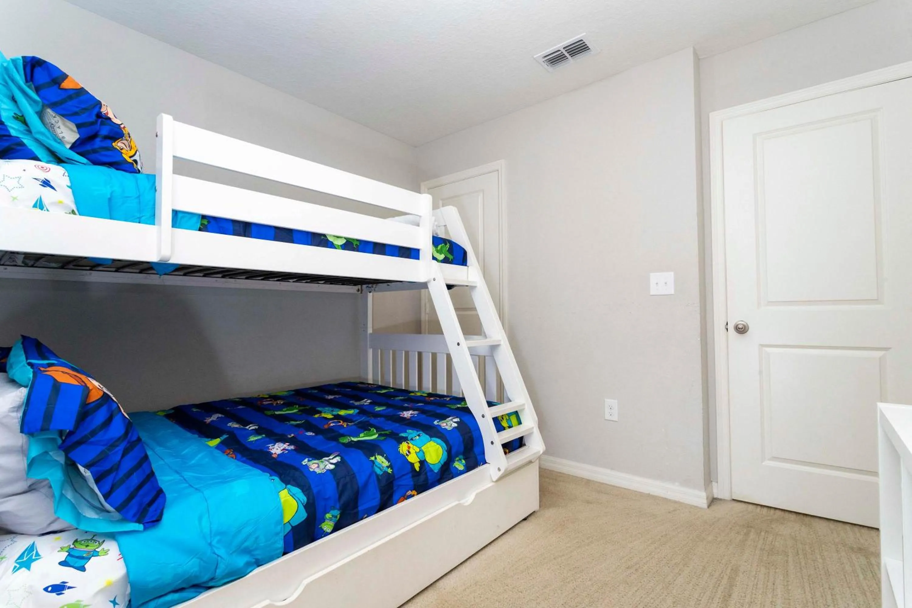 Bed in Four Bedrooms at Compass Bay Resort