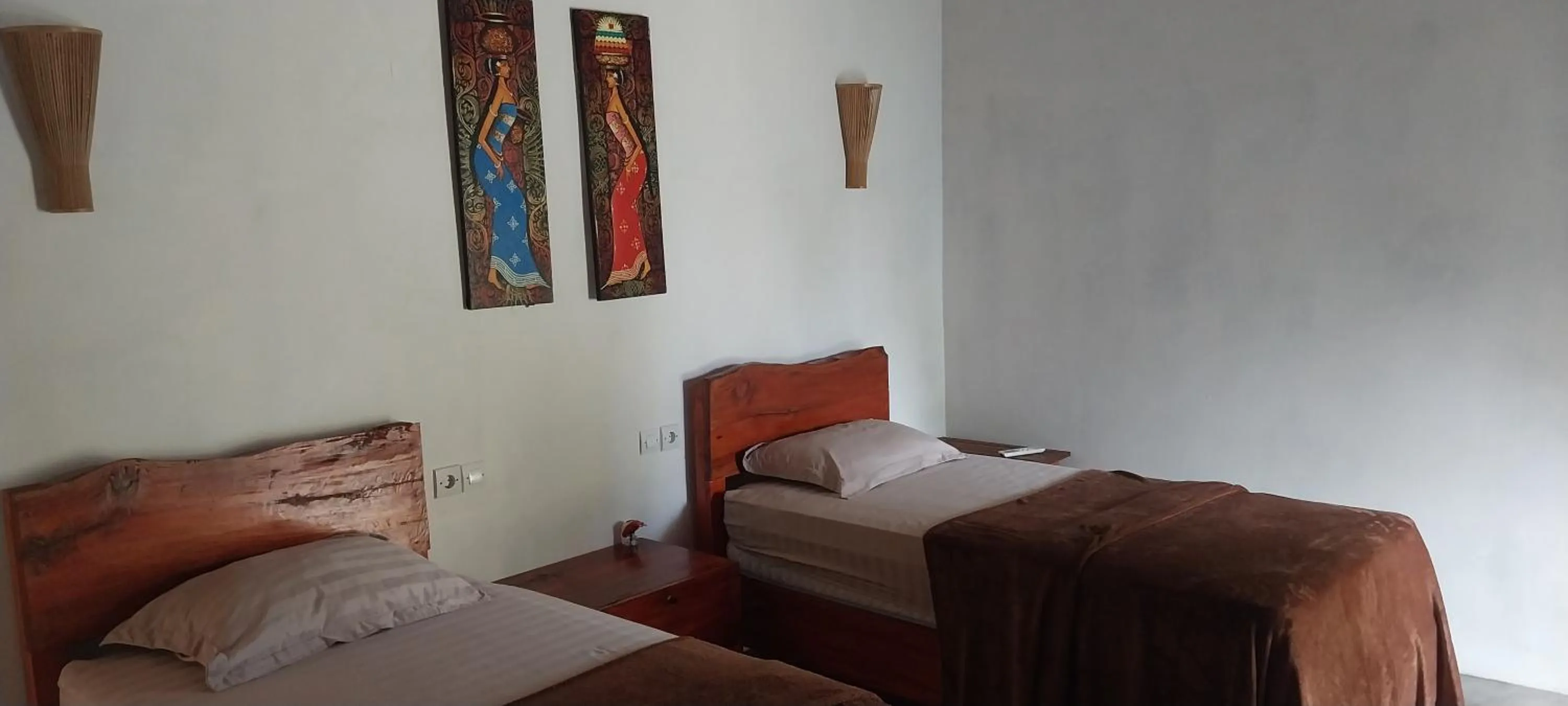 Bed in Kambuna Bungalow