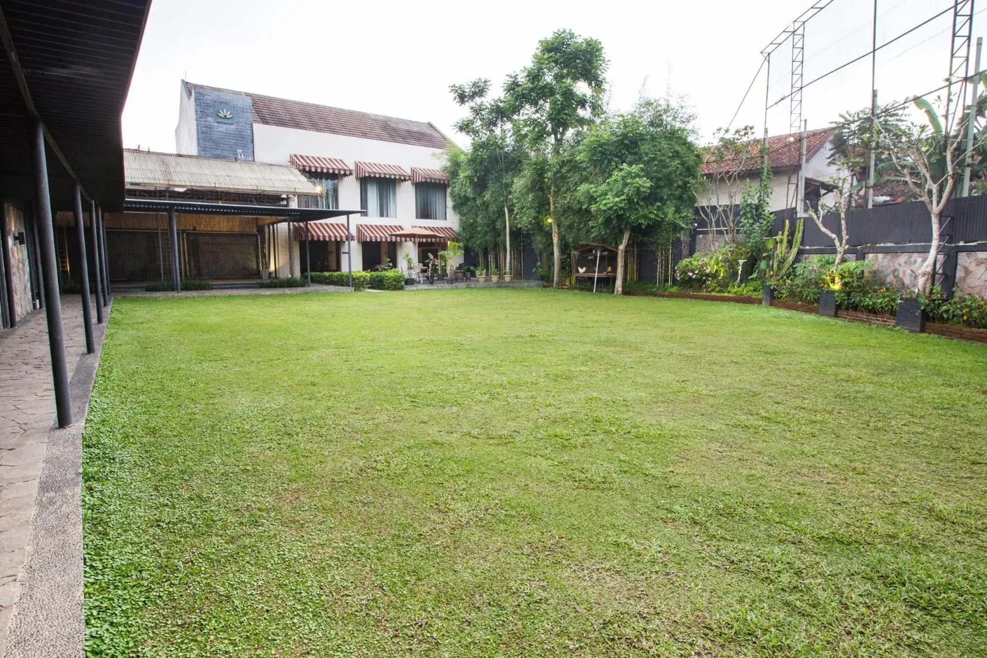 Garden in Gumilang Regency Hotel by Gumilang Hospitality