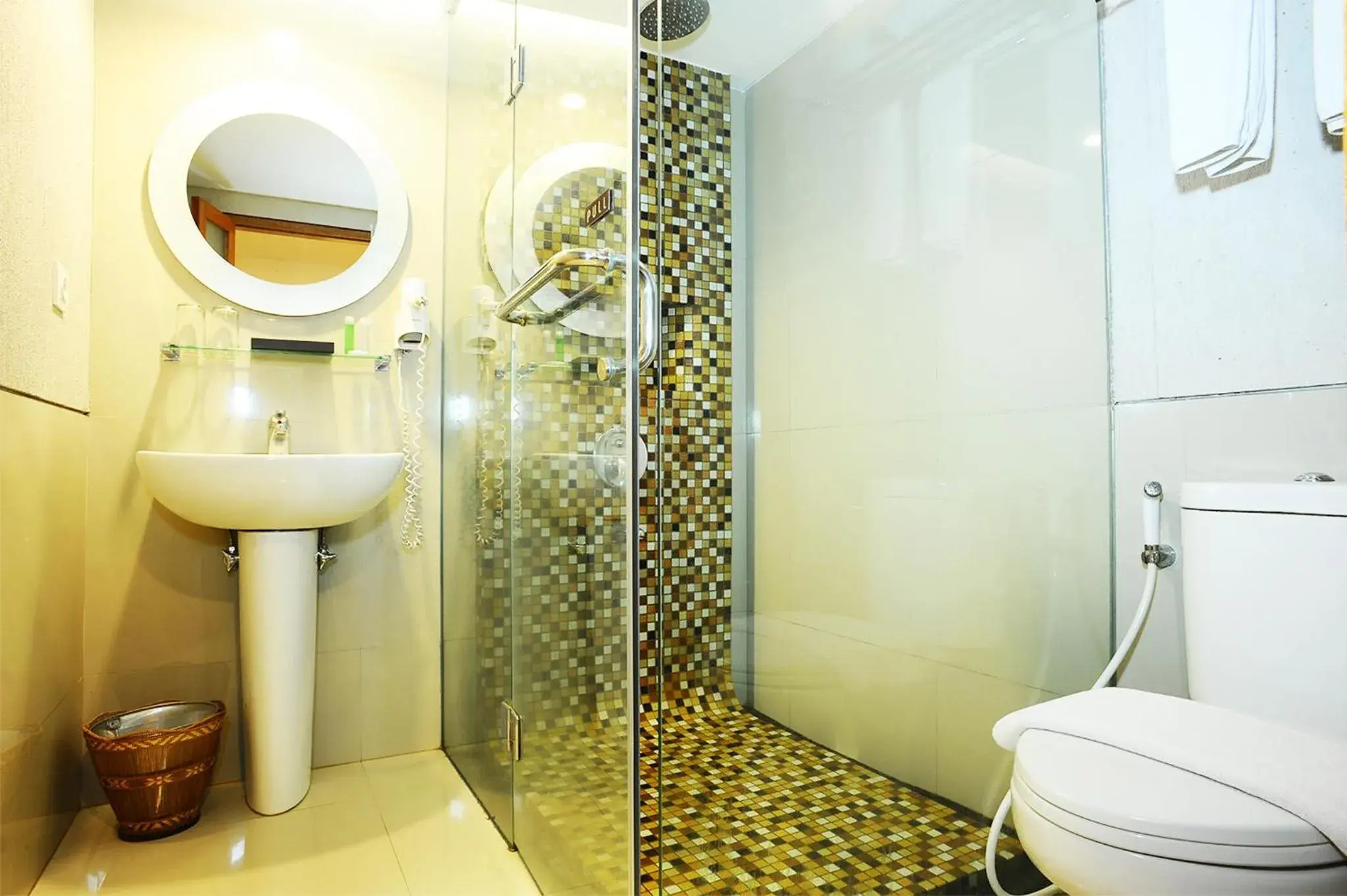 Bathroom in Gumilang Regency Hotel by Gumilang Hospitality