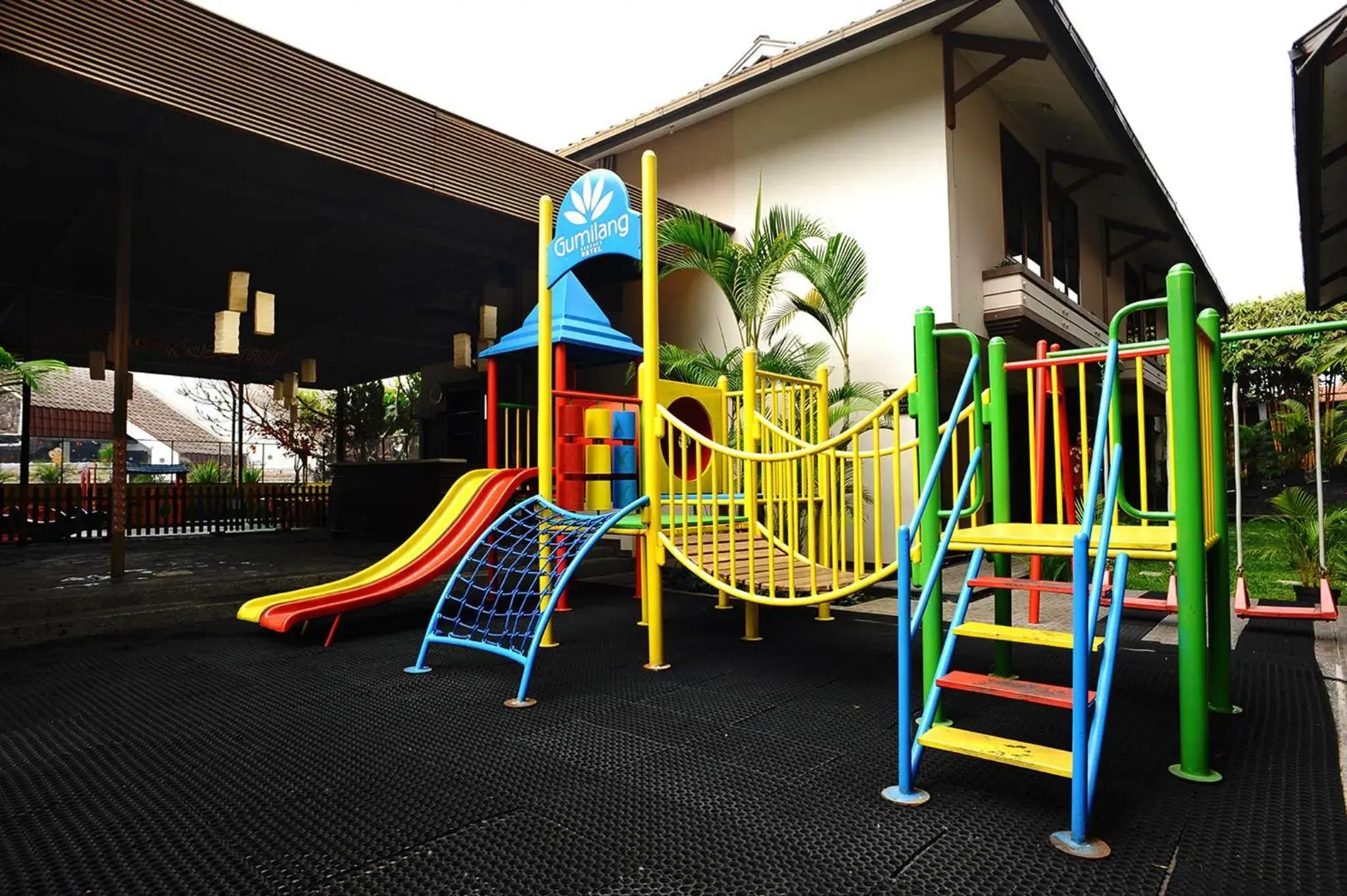 Children's Play Area in Gumilang Regency Hotel by Gumilang Hospitality