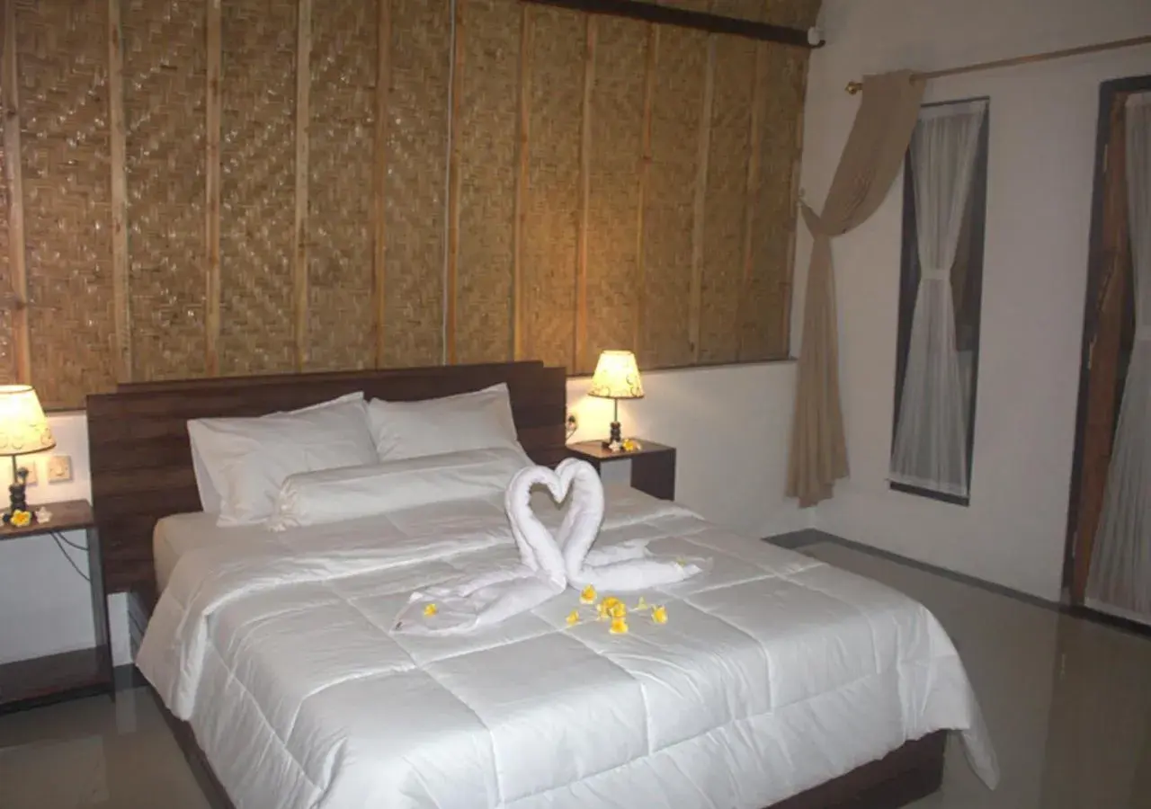 Bed in Sebrang Hills Bungalow Bed in Sebrang Hills Bungalow