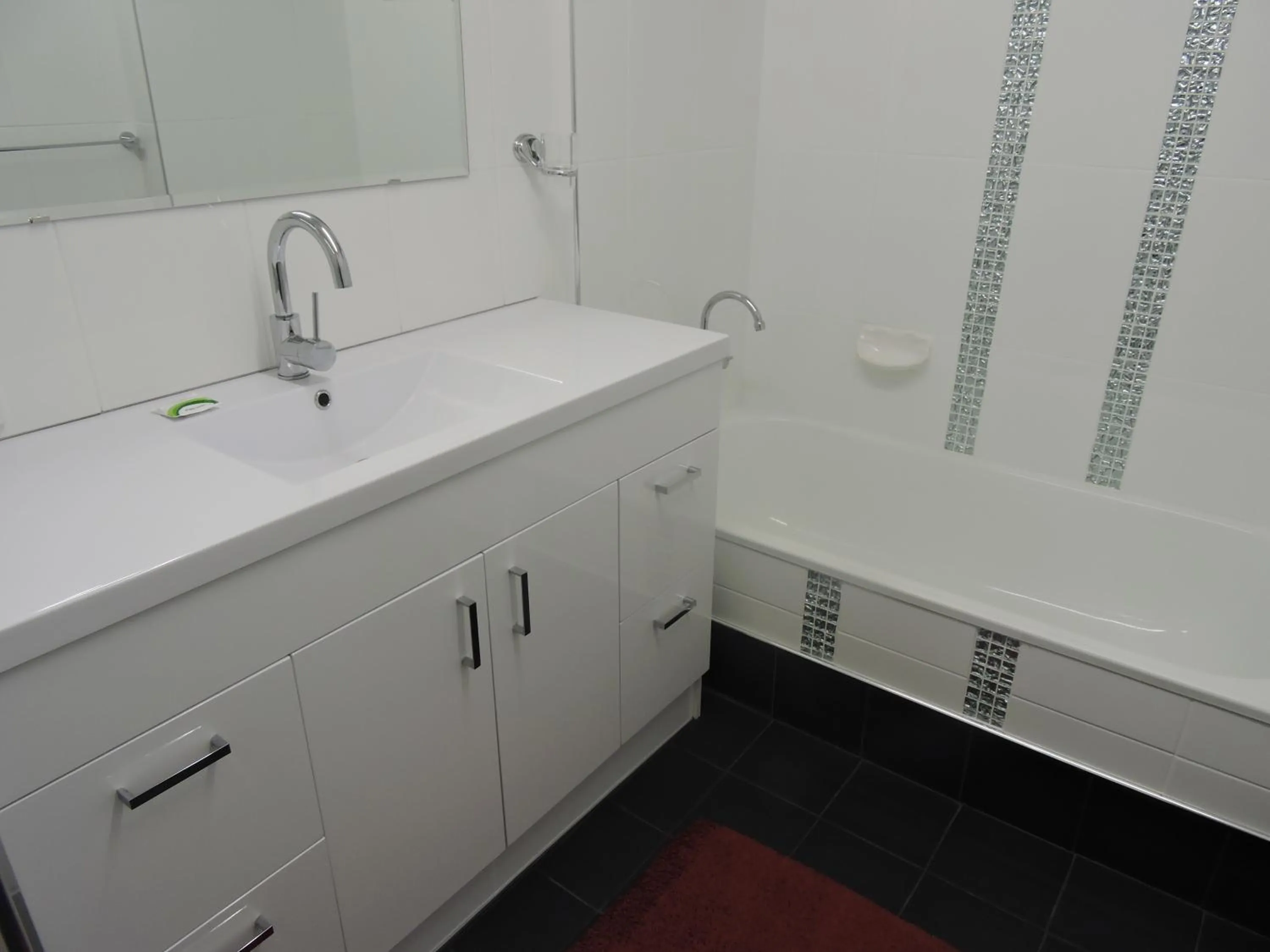 Bathroom in Bayview Beach Holiday Apartments