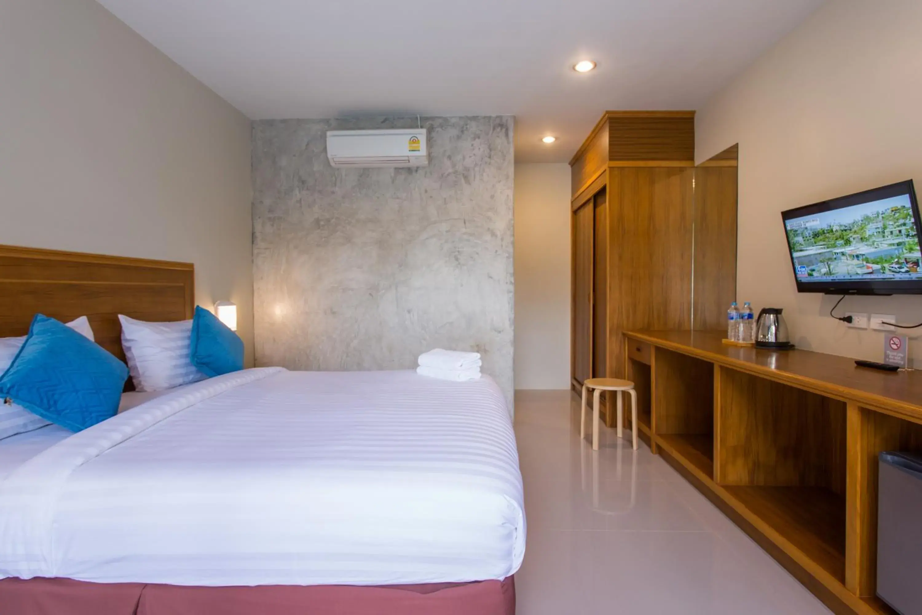 Bed in Light Khao Lak Resort Bed in Light Khao Lak Resort