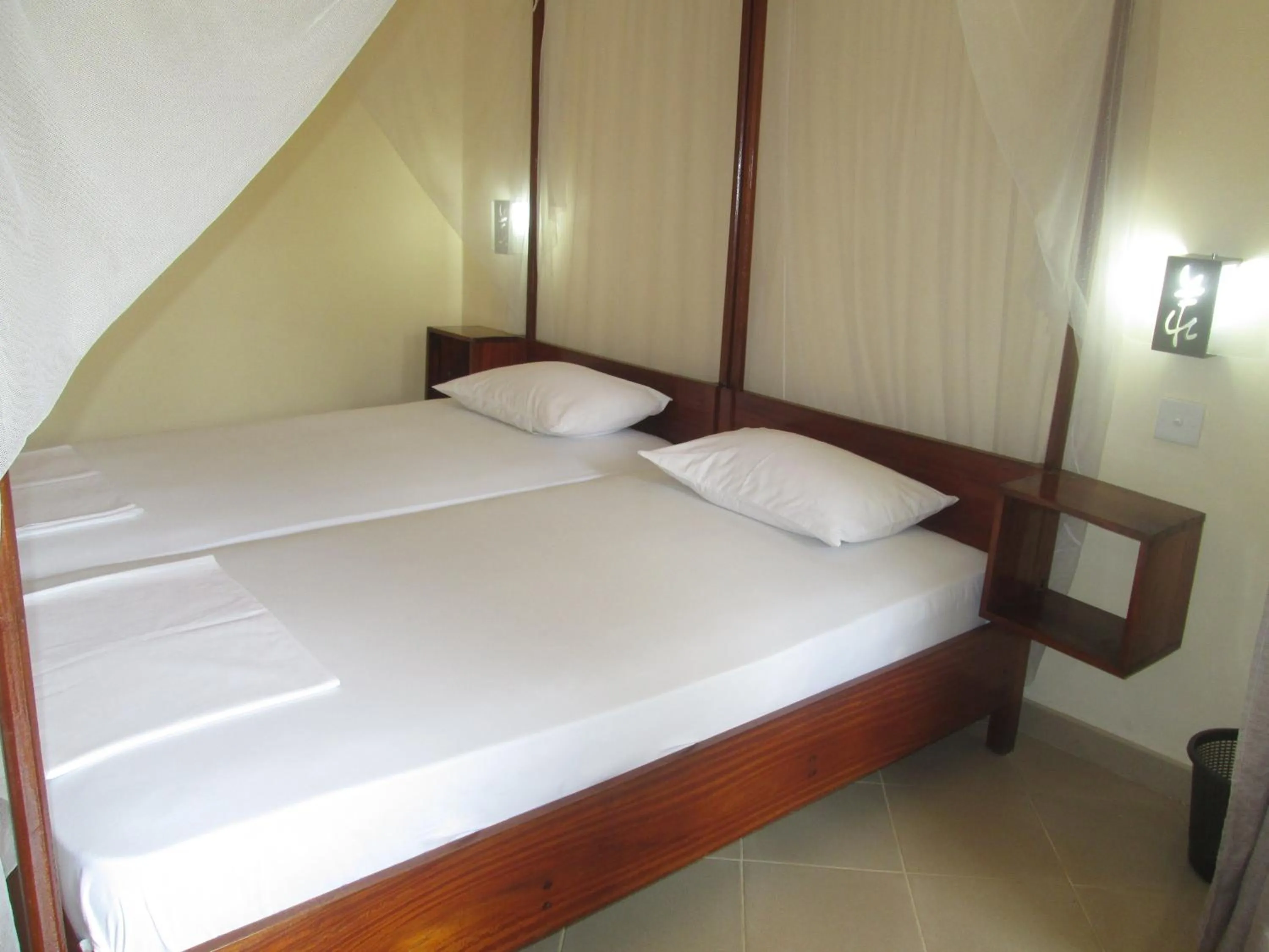 Bed in Tandem Guesthouse