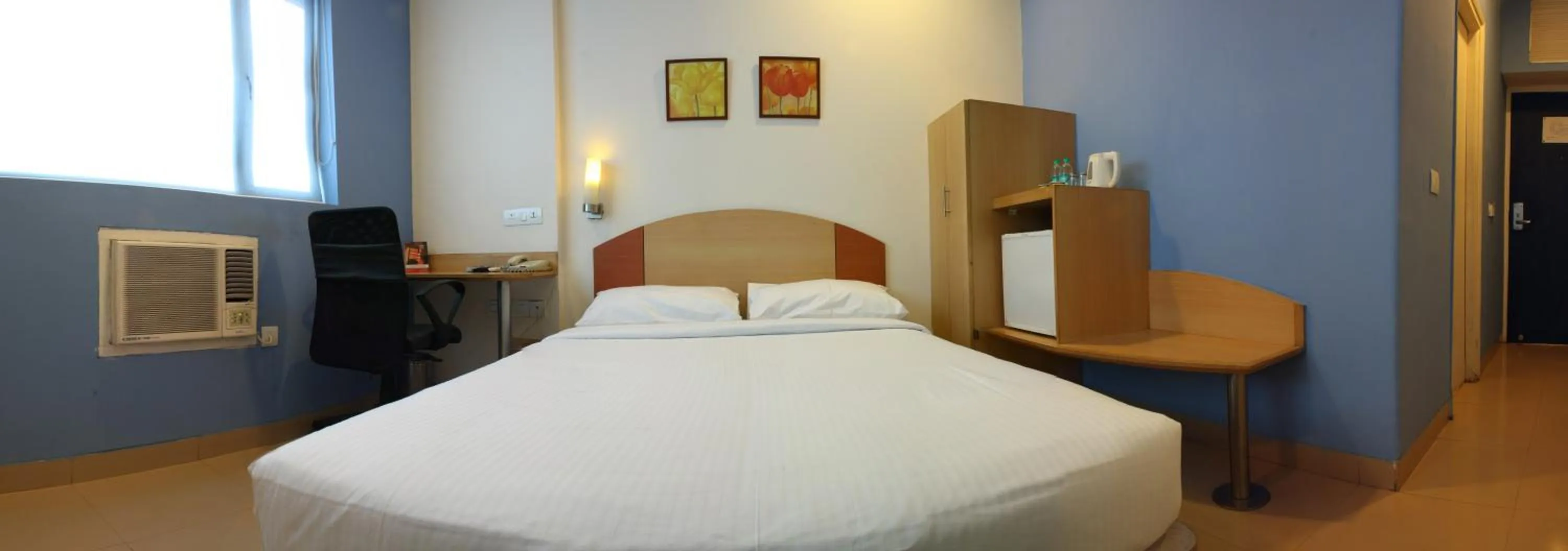 Photo of the whole room, Bed in Ginger Pantnagar