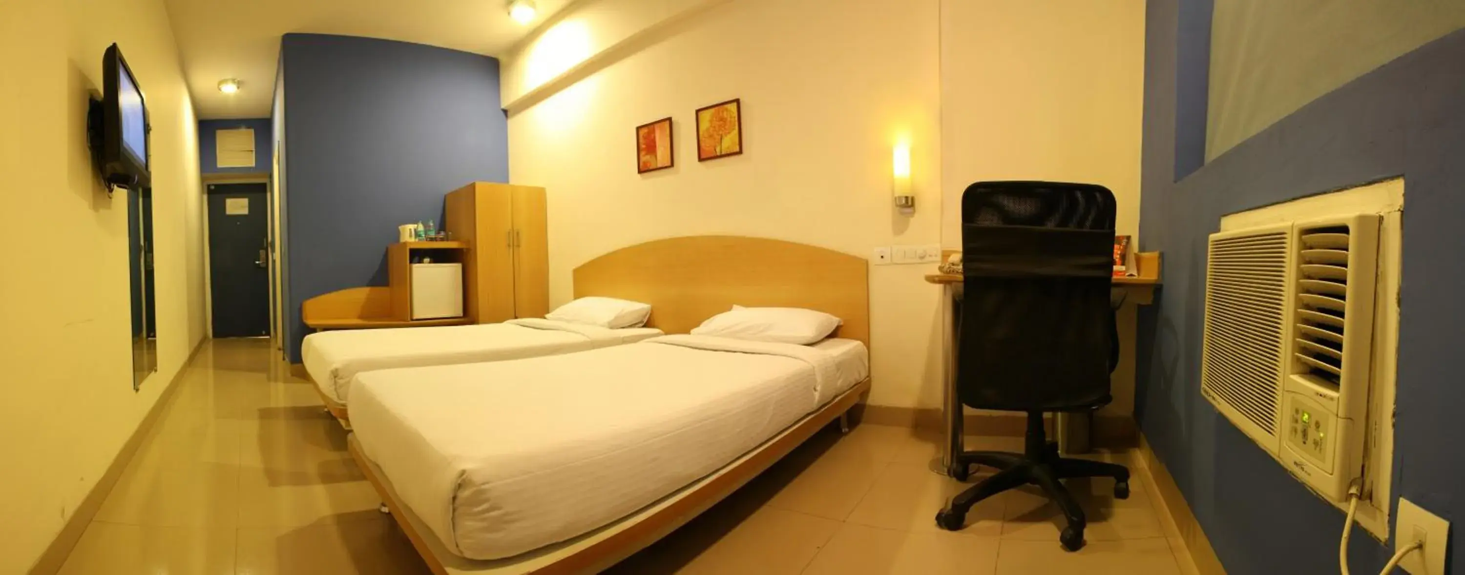 Photo of the whole room, Bed in Ginger Pantnagar Photo of the whole room, Bed in Ginger Pantnagar