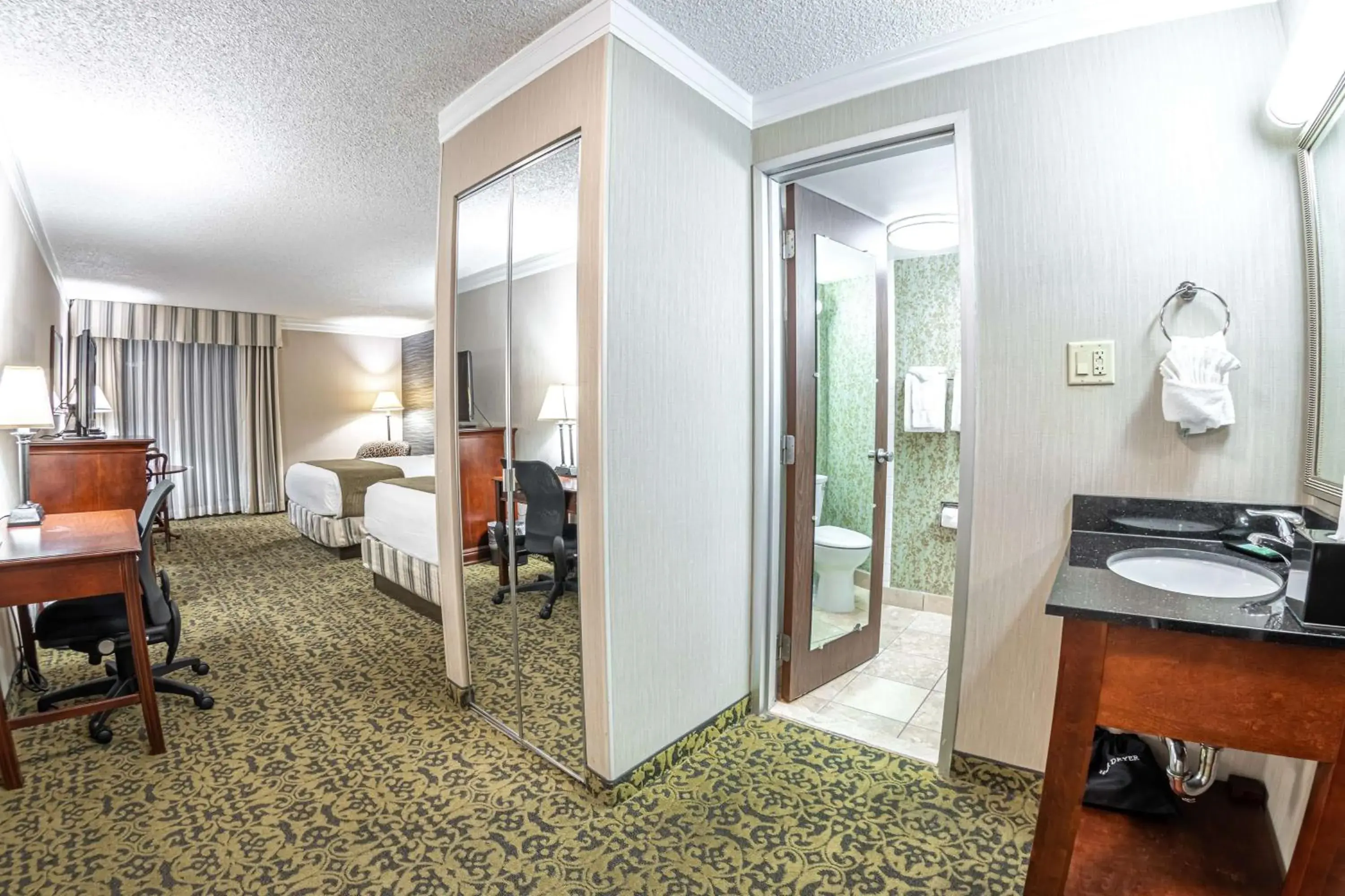 Bedroom in Salt Lake Plaza Hotel SureStay Collection by Best Western Bedroom in Salt Lake Plaza Hotel SureStay Collection by Best Western