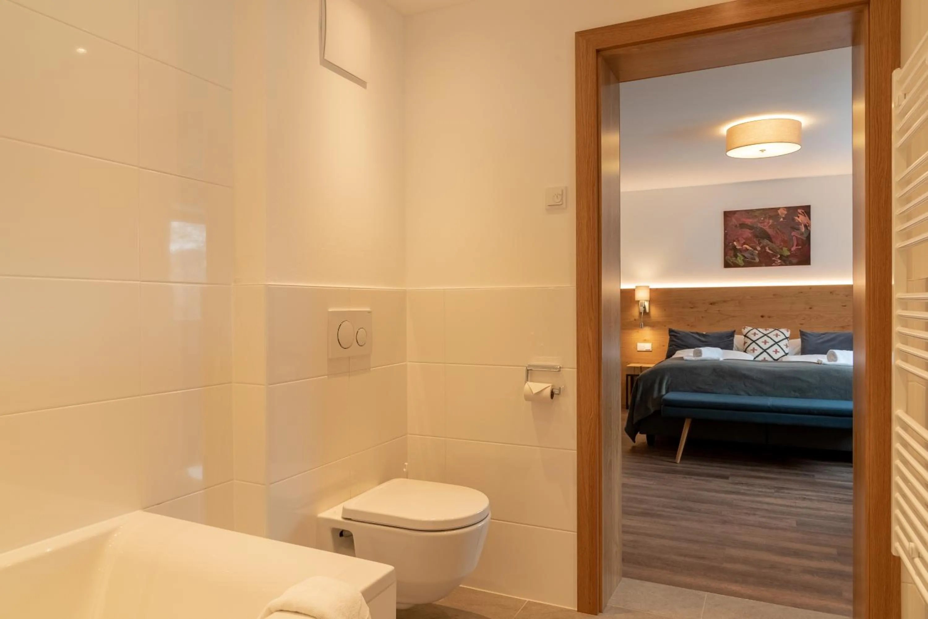 Bathroom, Bed in Finest Villa Zell am See by All in One Apartments incl SUMMER CARD