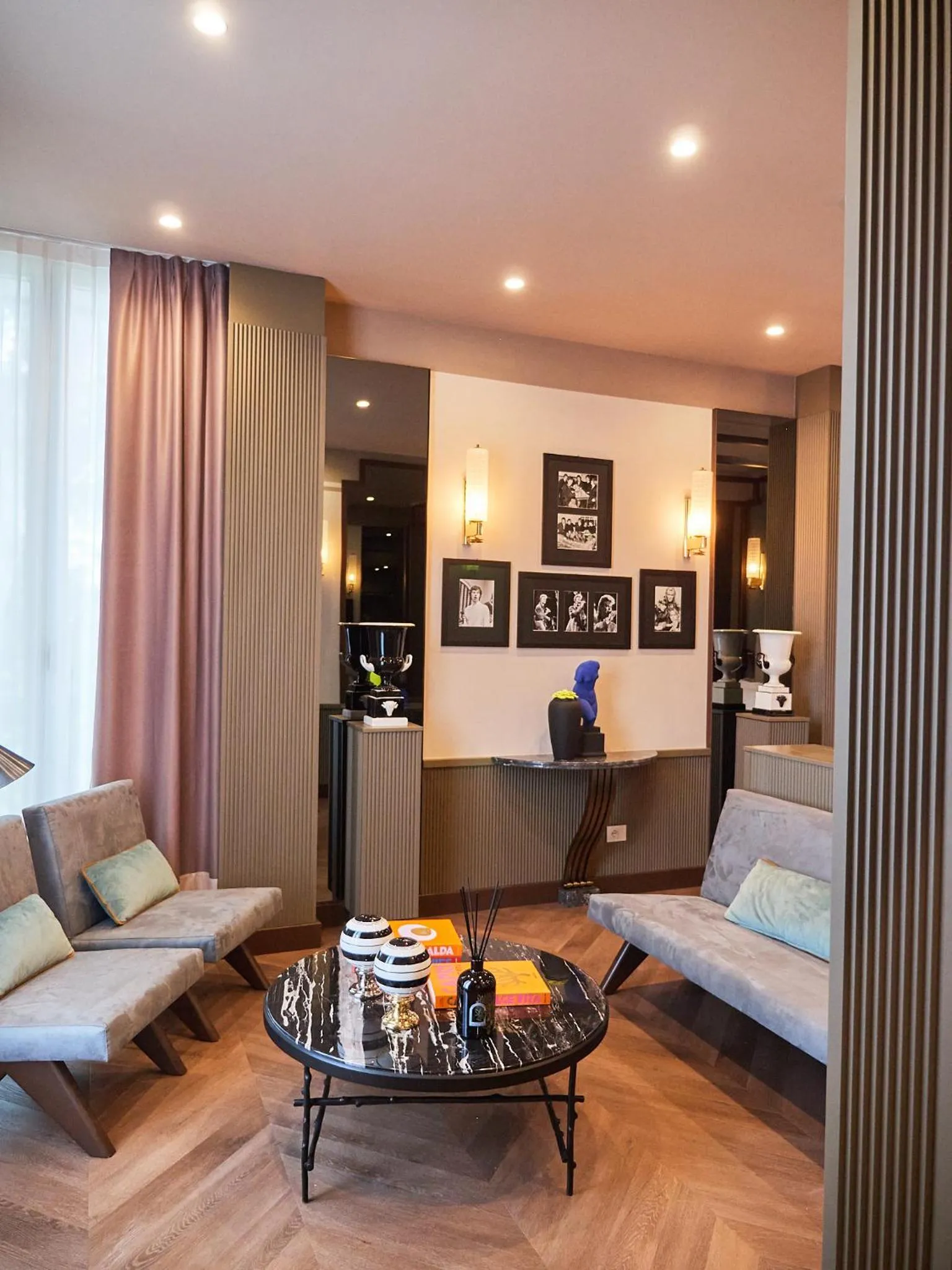 Seating area in The Glam Boutique Hotel & Apt