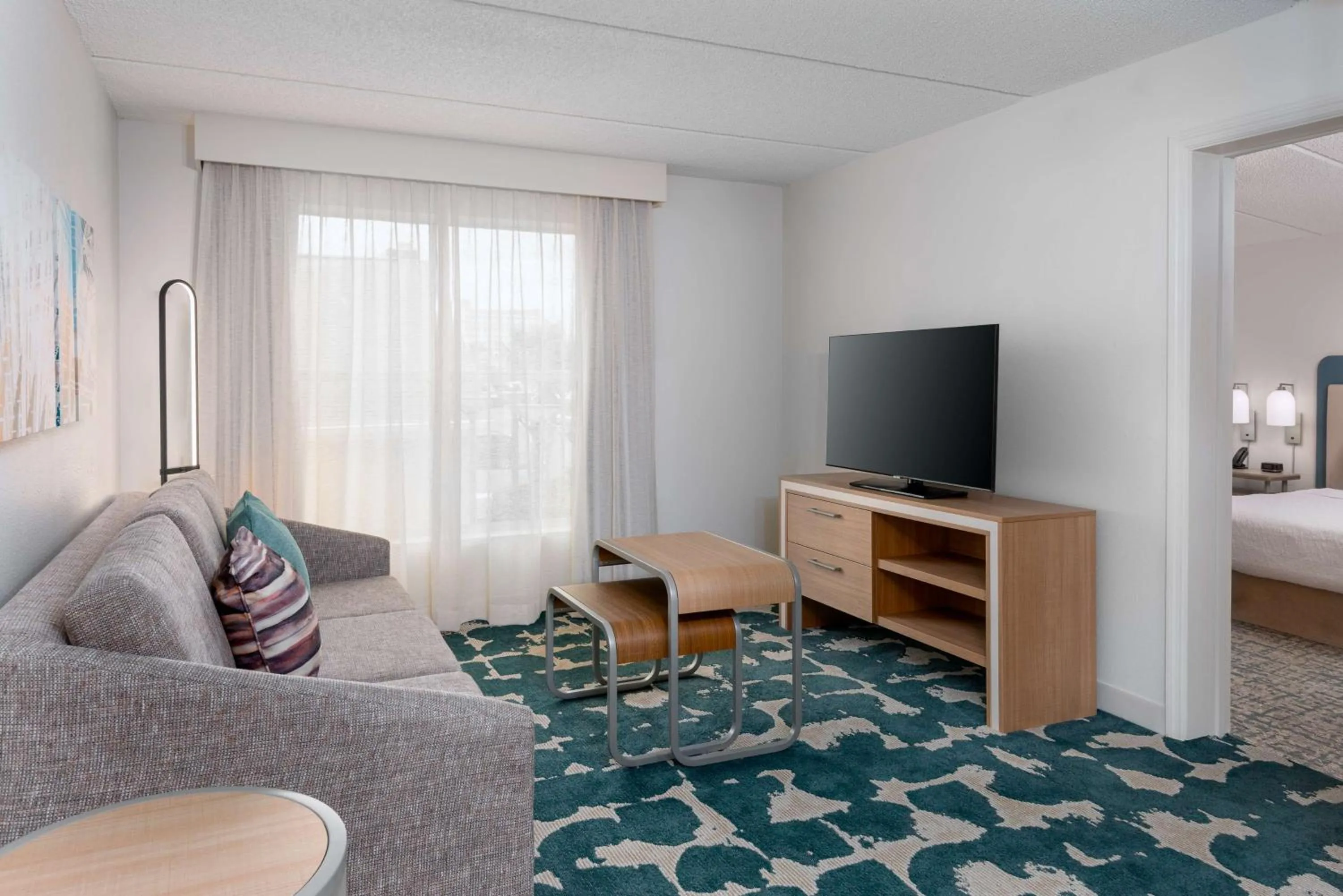 Living room, Bed in Homewood Suites by Hilton Orlando-Nearest to Universal Studios