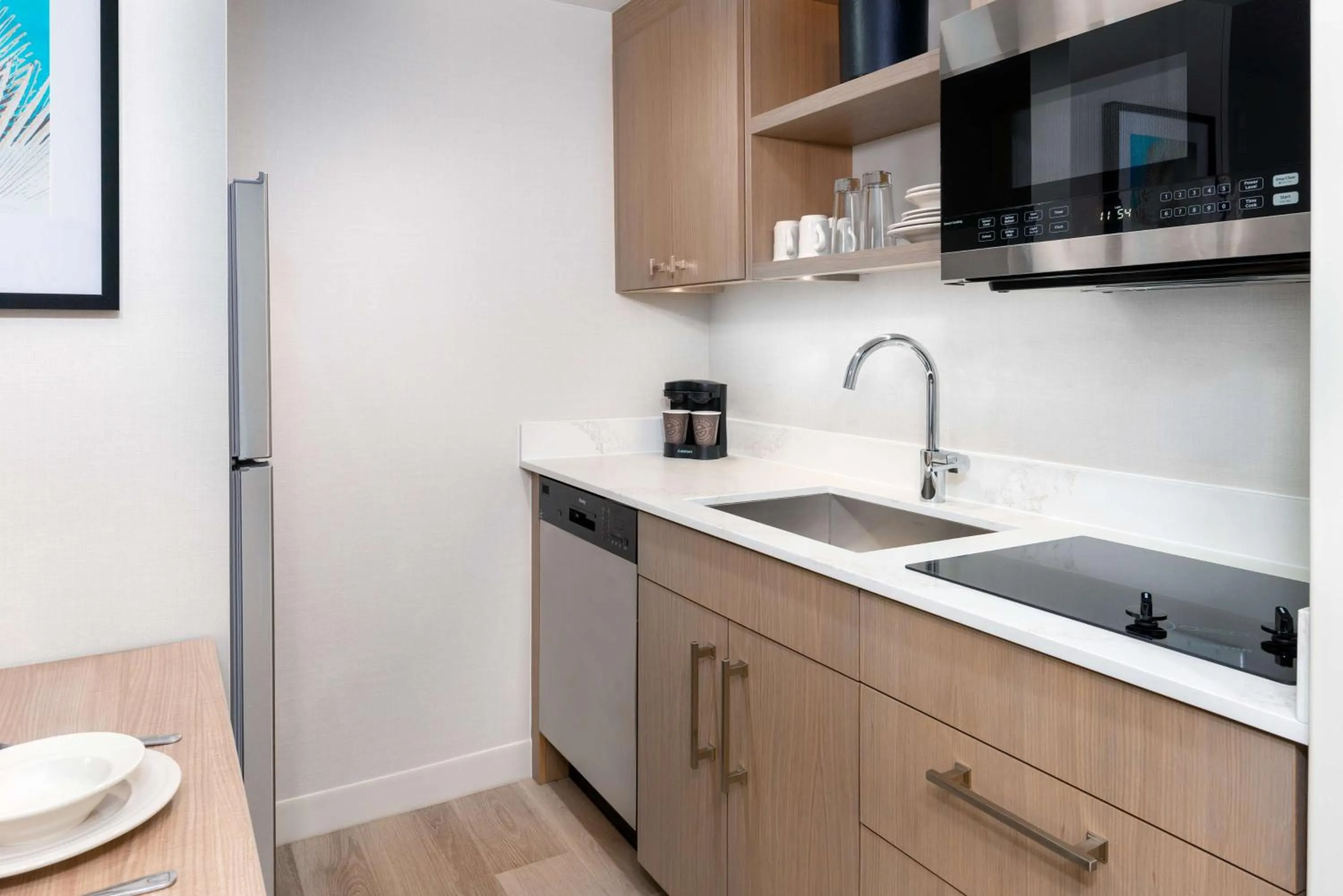 Kitchen or kitchenette in Homewood Suites by Hilton Orlando-Nearest to Universal Studios