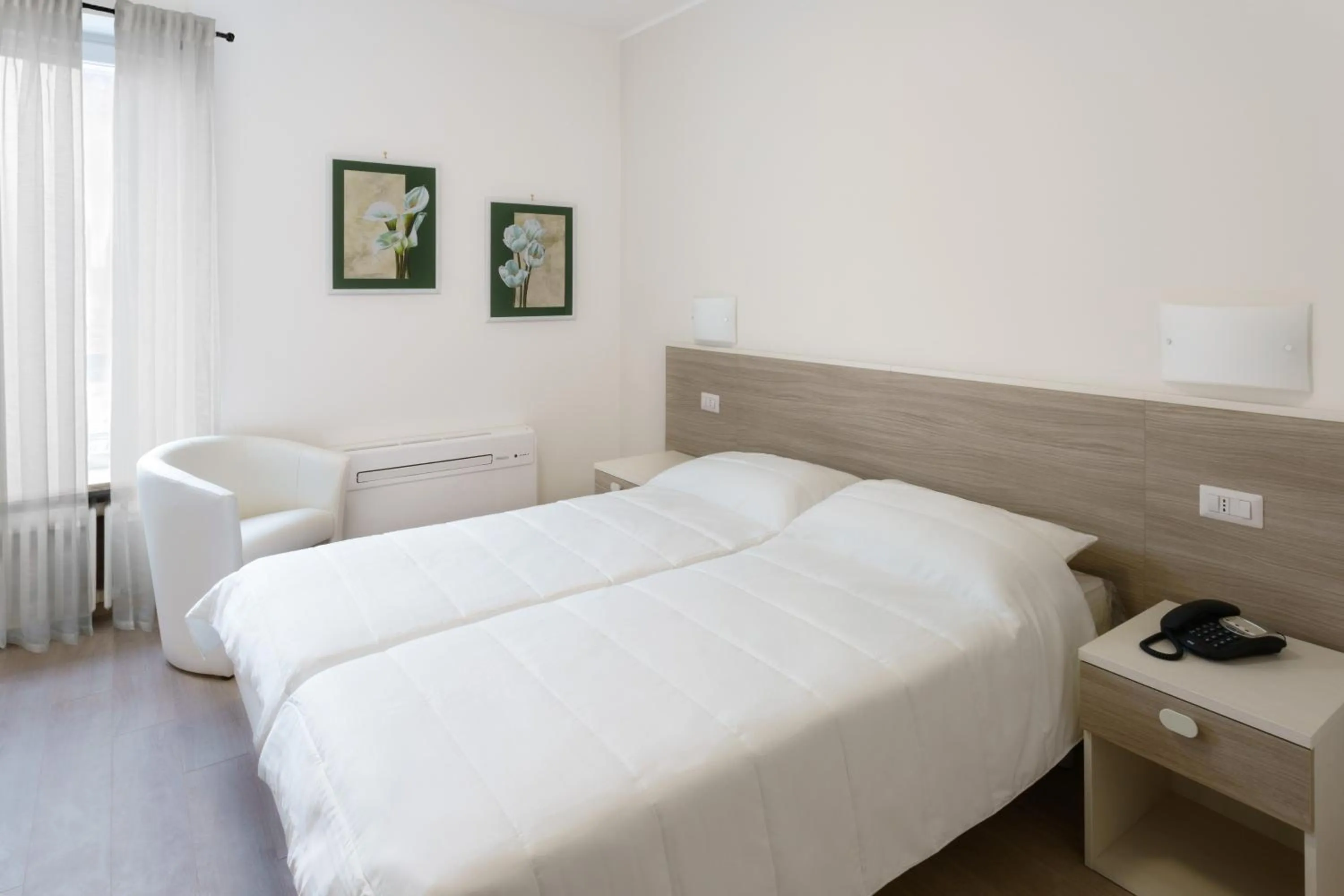 Bed in Hotel Roma