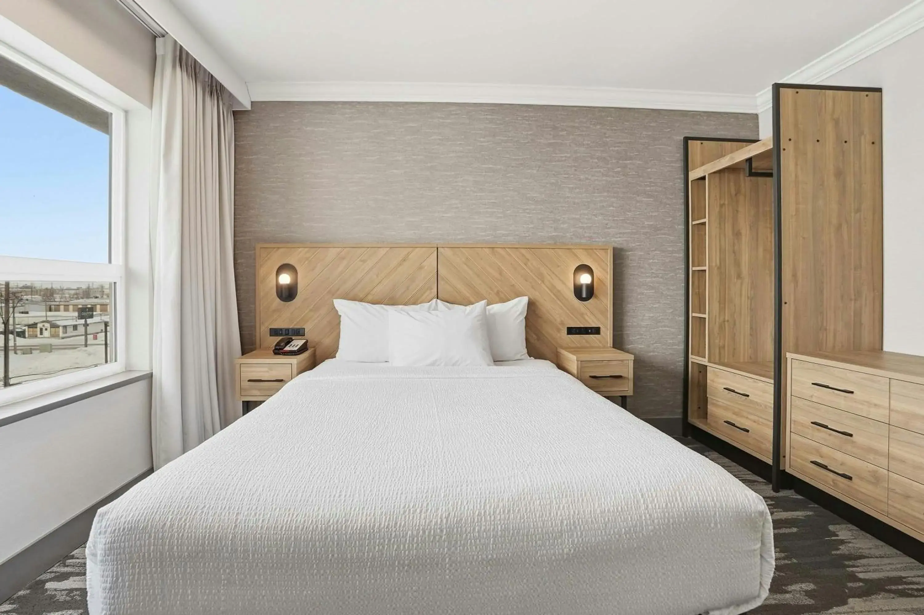 Photo of the whole room, Bed in Sandman Hotel Saskatoon Photo of the whole room, Bed in Sandman Hotel Saskatoon