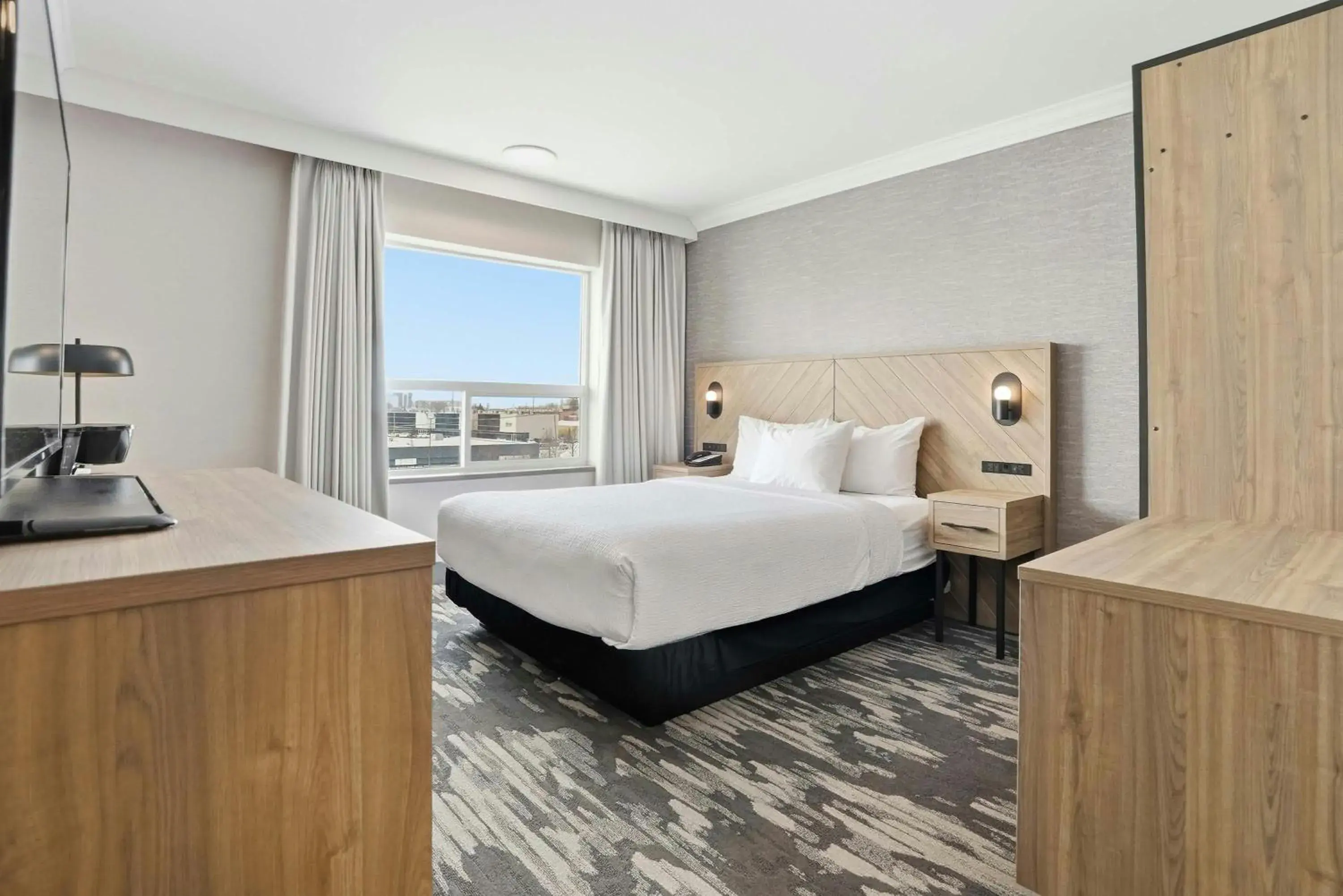 Photo of the whole room, Bed in Sandman Hotel Saskatoon Photo of the whole room, Bed in Sandman Hotel Saskatoon