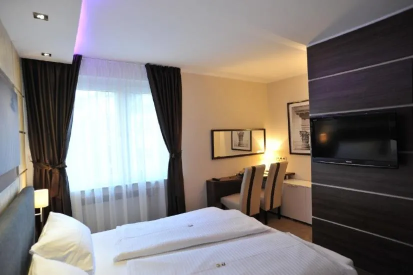 Bed in Hotel Bergischer Hof