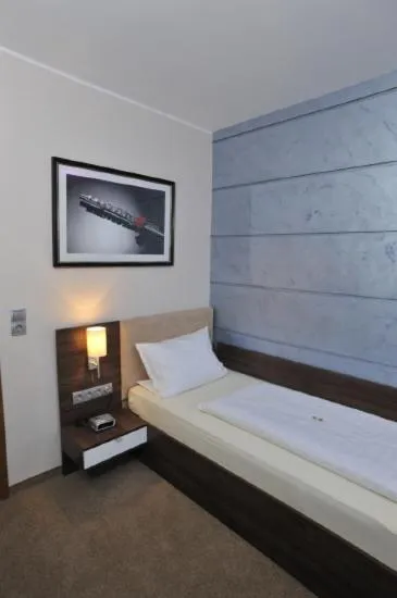 Bed in Hotel Bergischer Hof