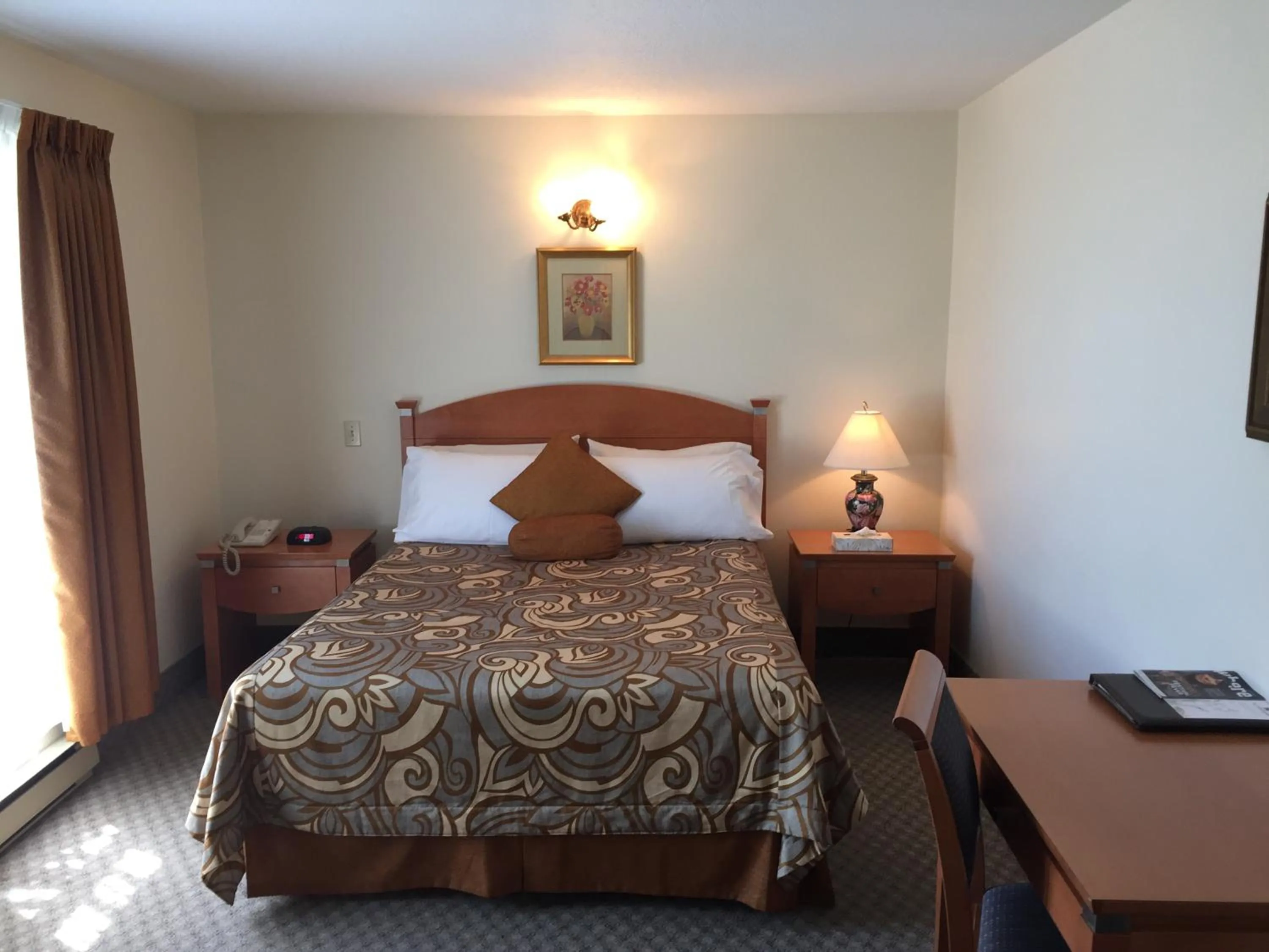 Bed in Motel Du Chevalier